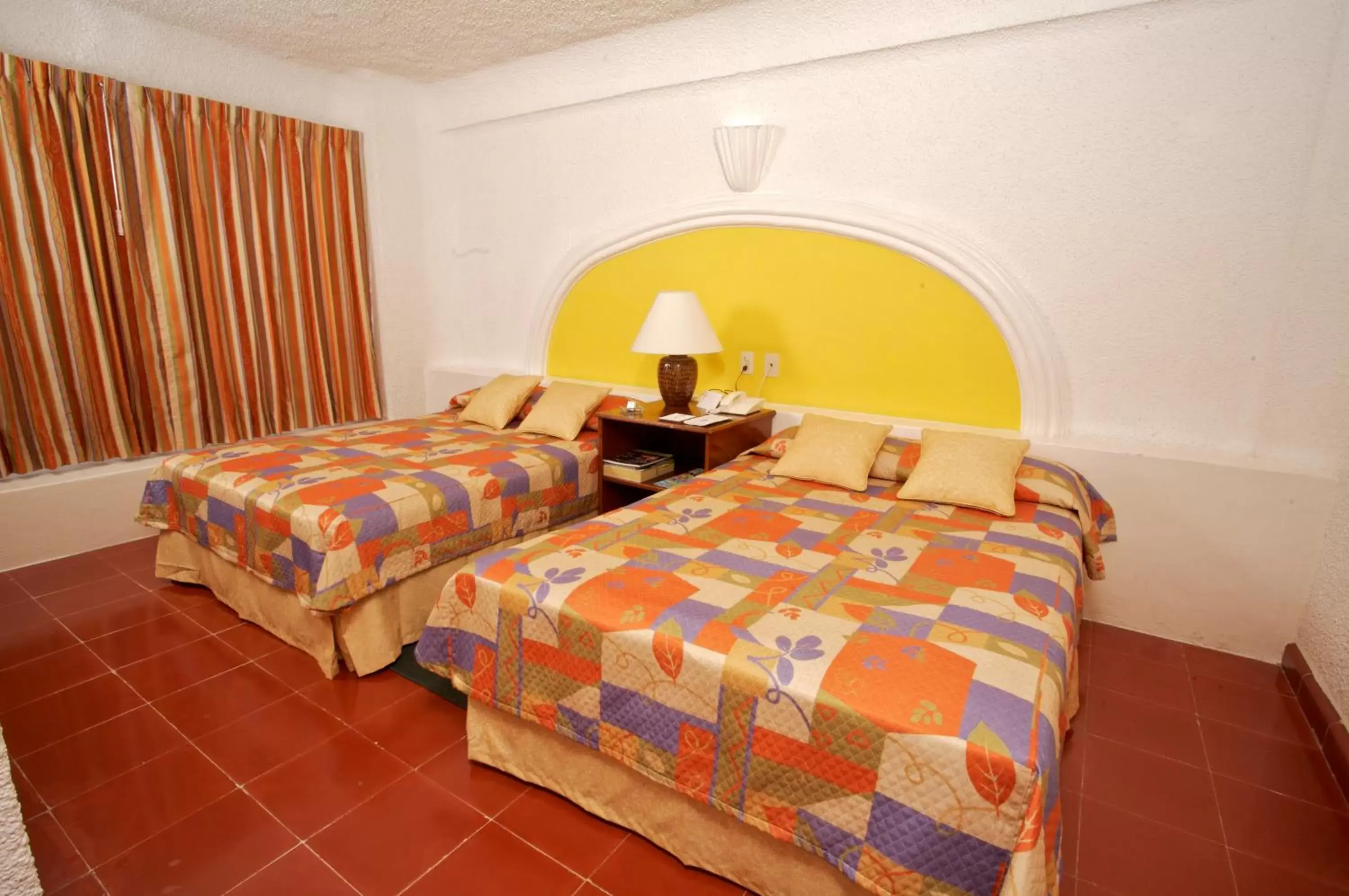 Bed in Hotel Antillano
