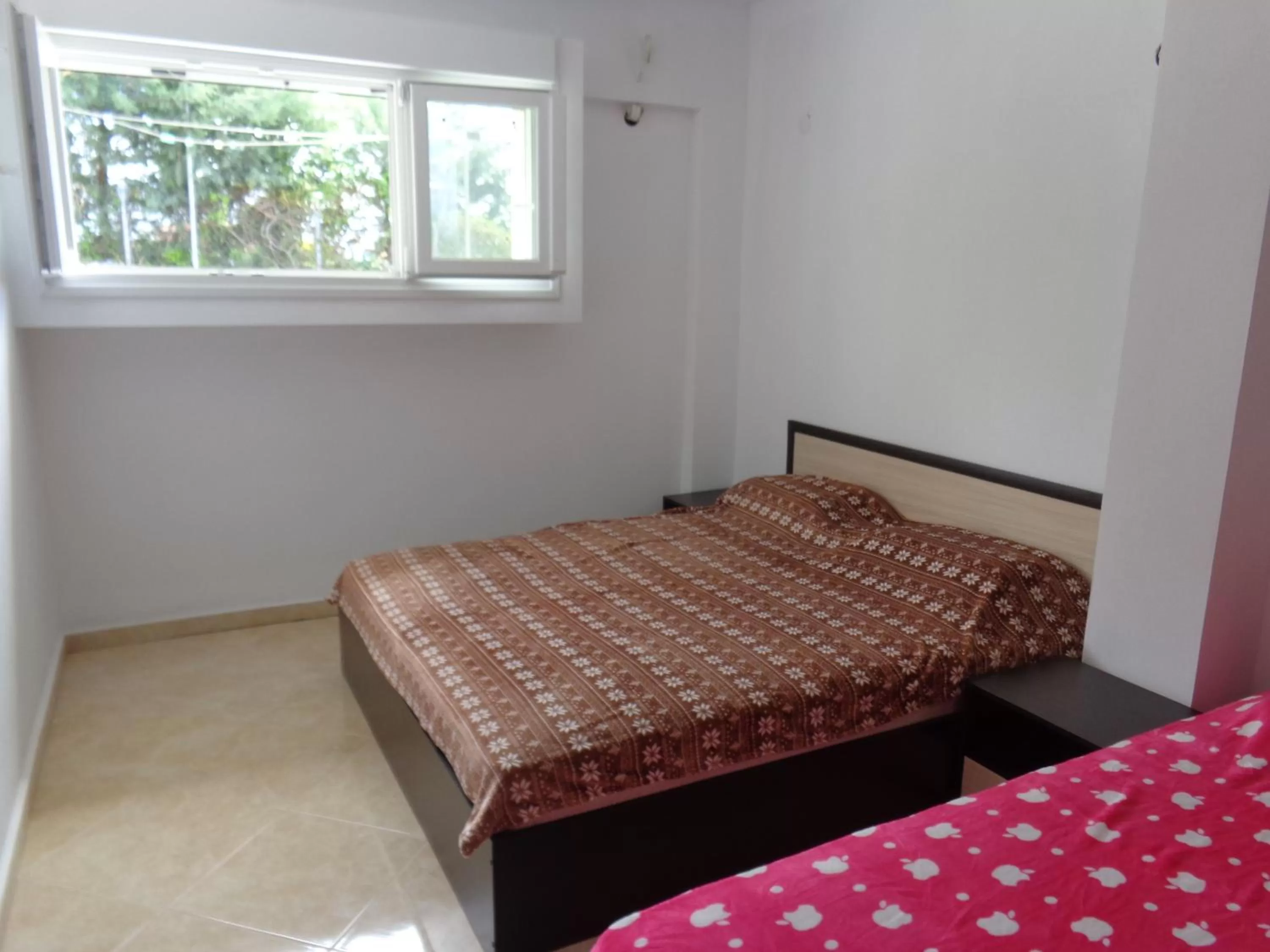 Bed in Apartments Vladimir