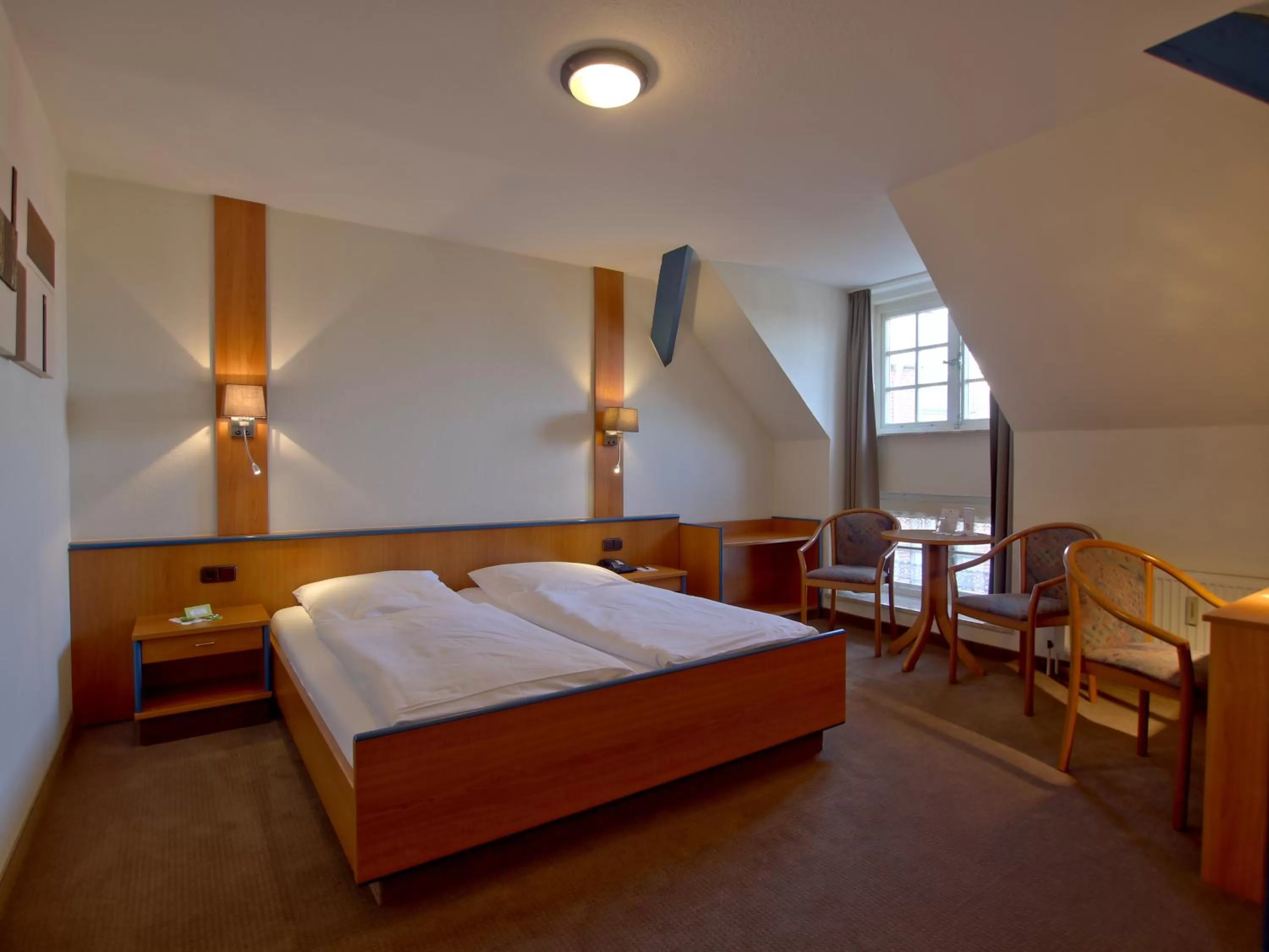 Bed in Hotel Friesische Wehde