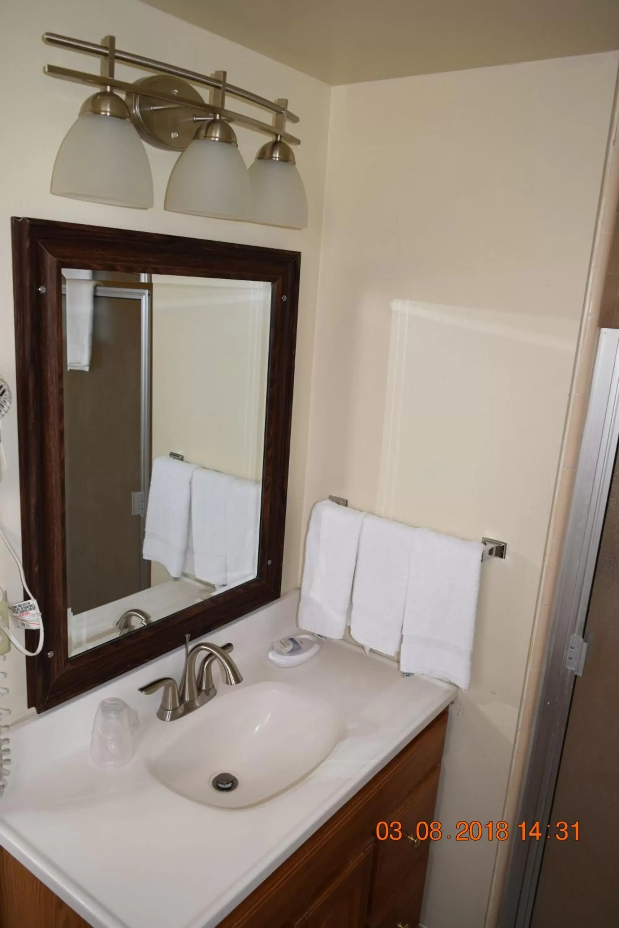 Bathroom in Stanlunds Inn and Suites