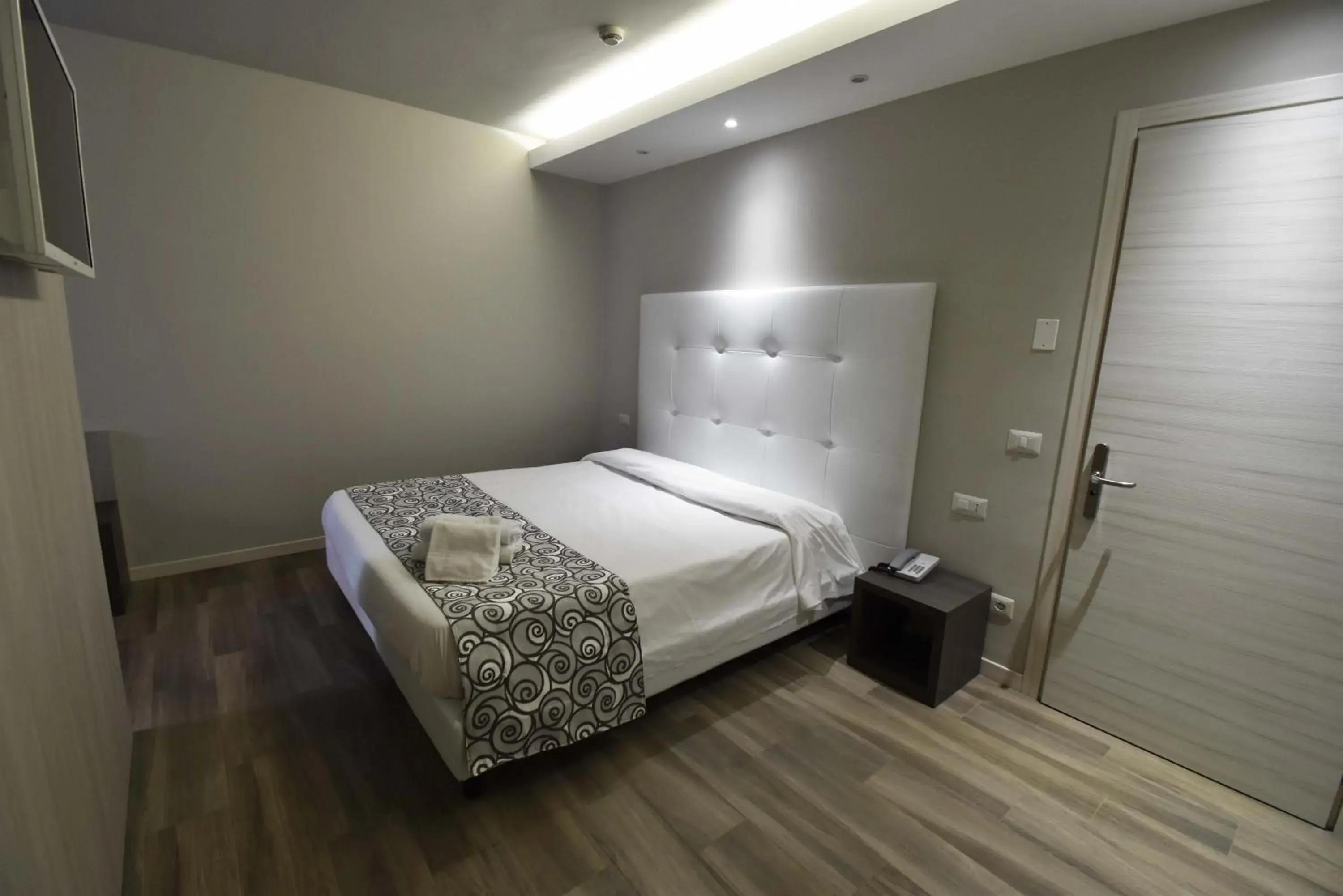 Bed in Hotel Riposo