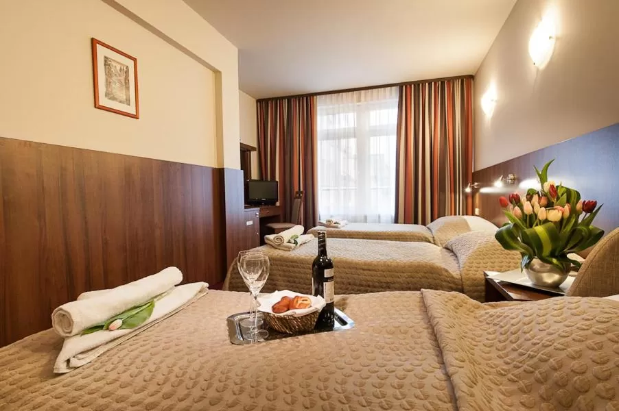 Bed in Hotel Alexander