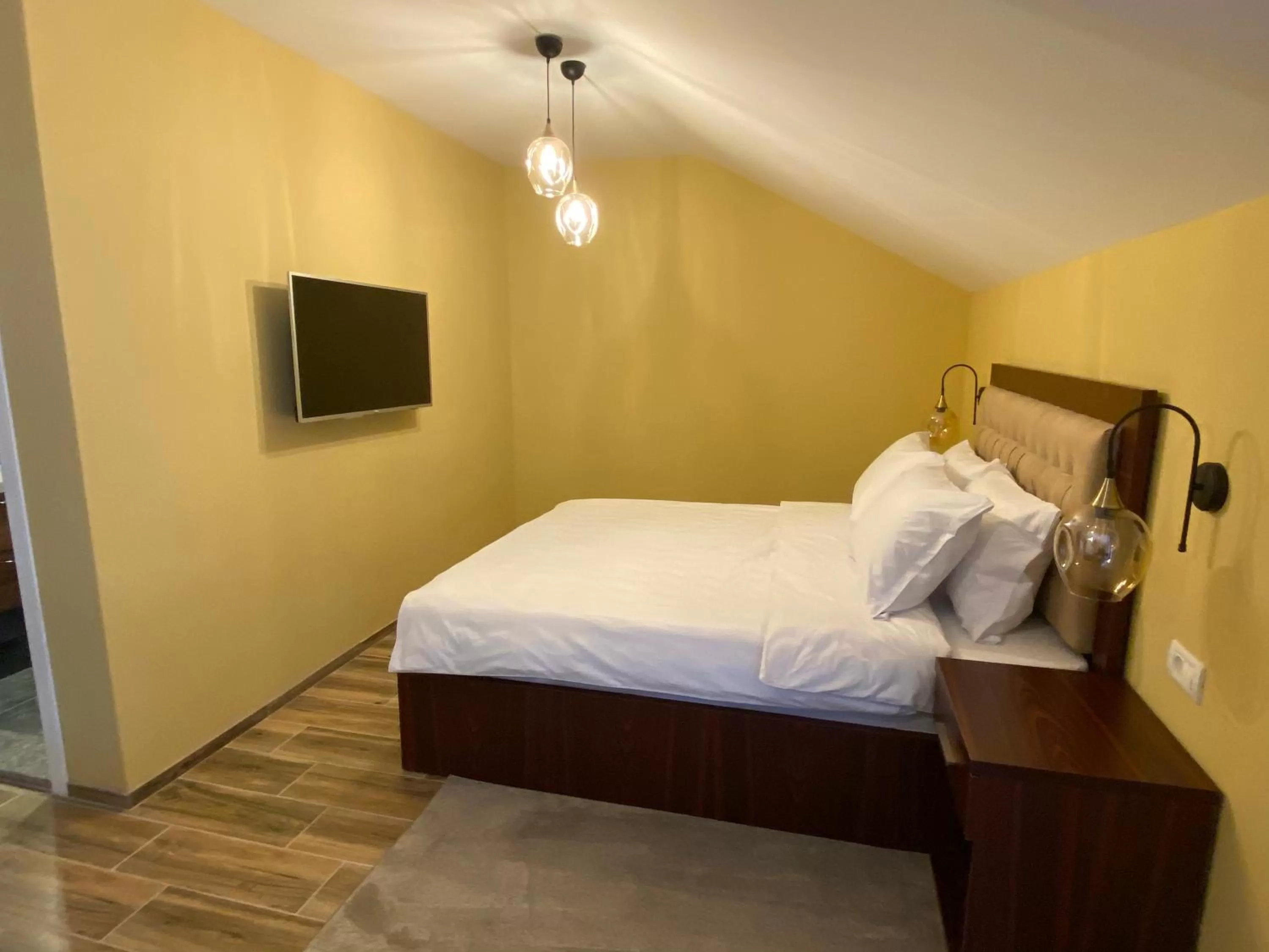 Bed in Hotel Kolonja's