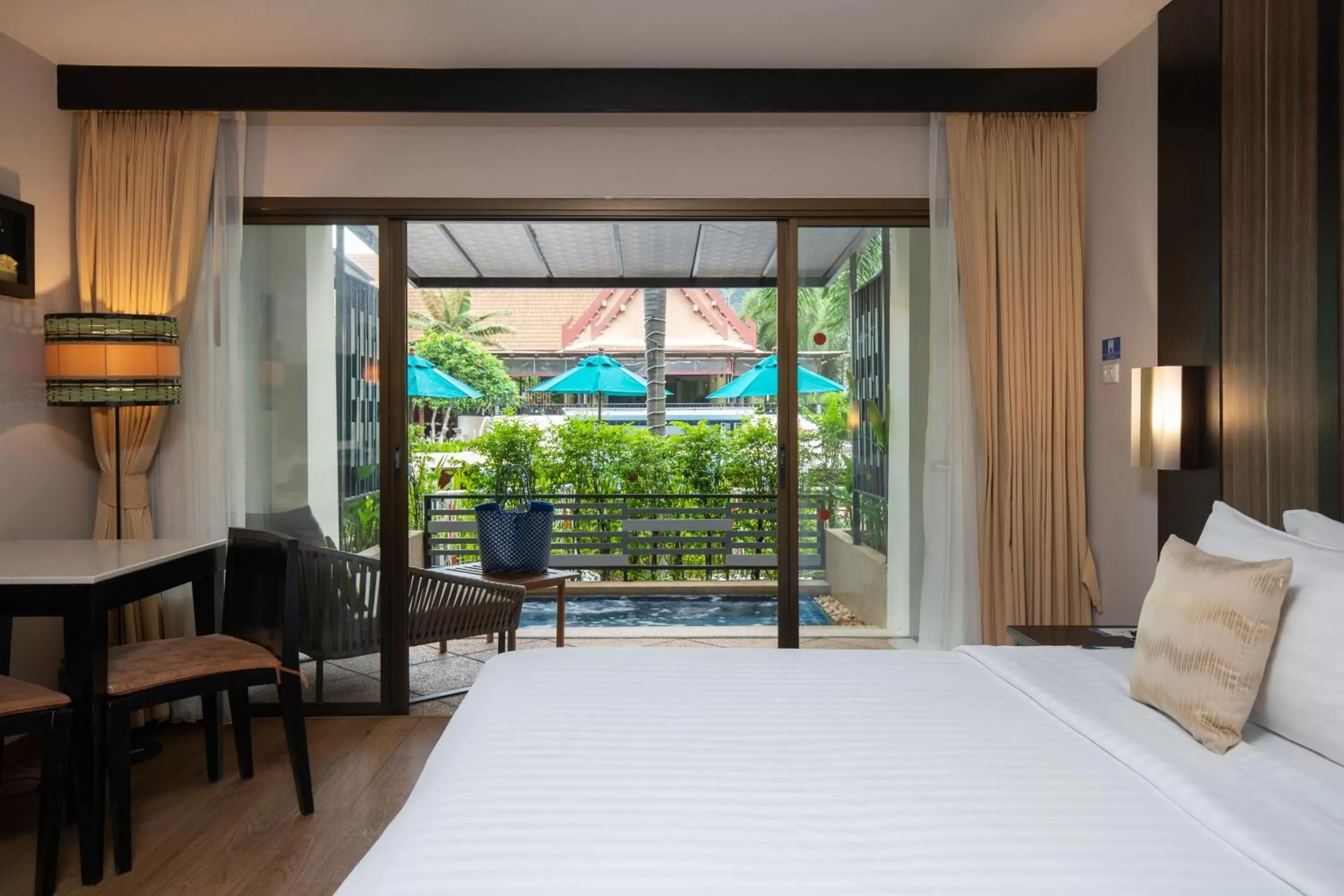 Photo of the whole room, Bed in Deevana Patong Resort & Spa - SHA Extra Plus