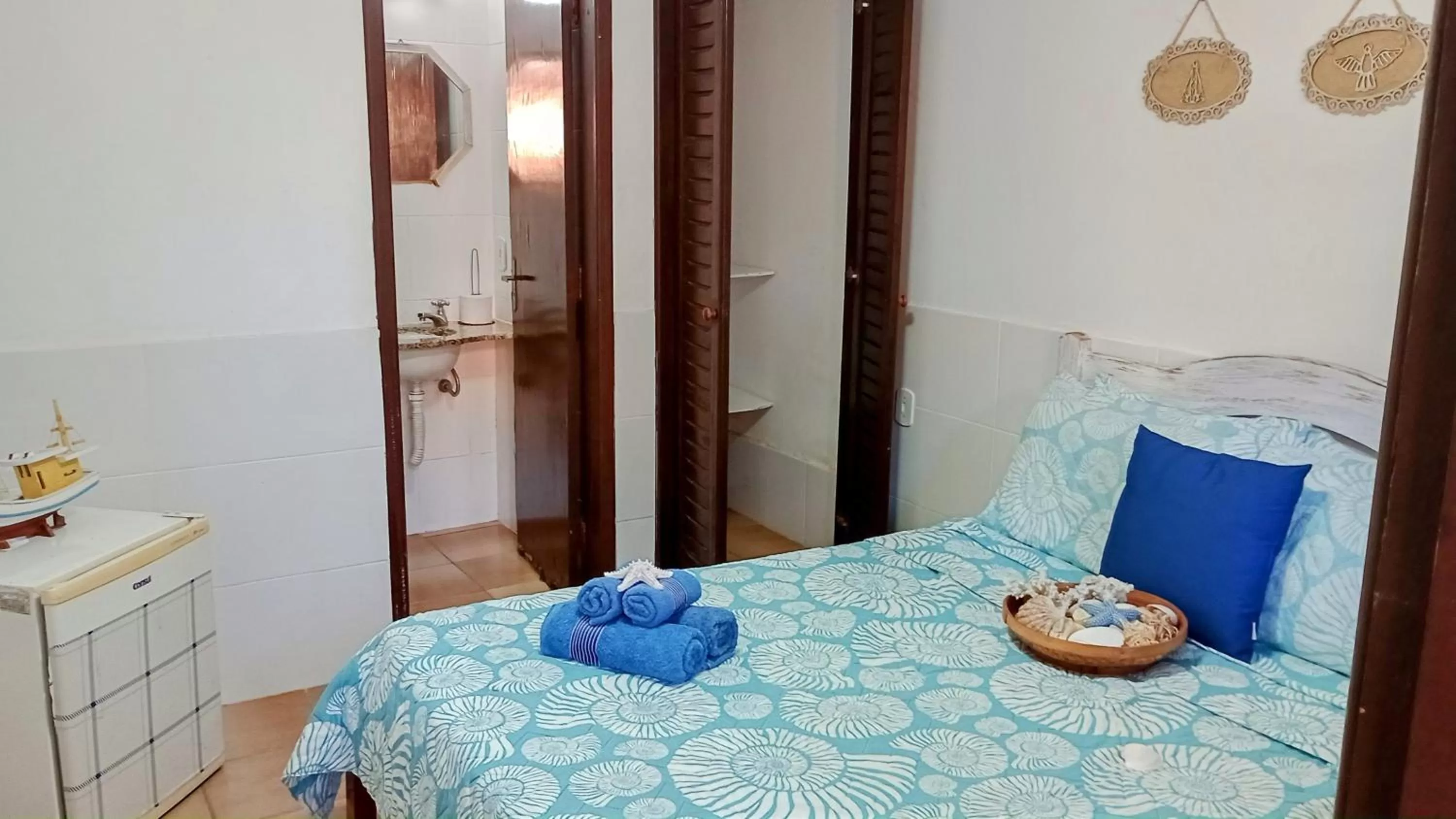 Bed in Hibiscos Pousada