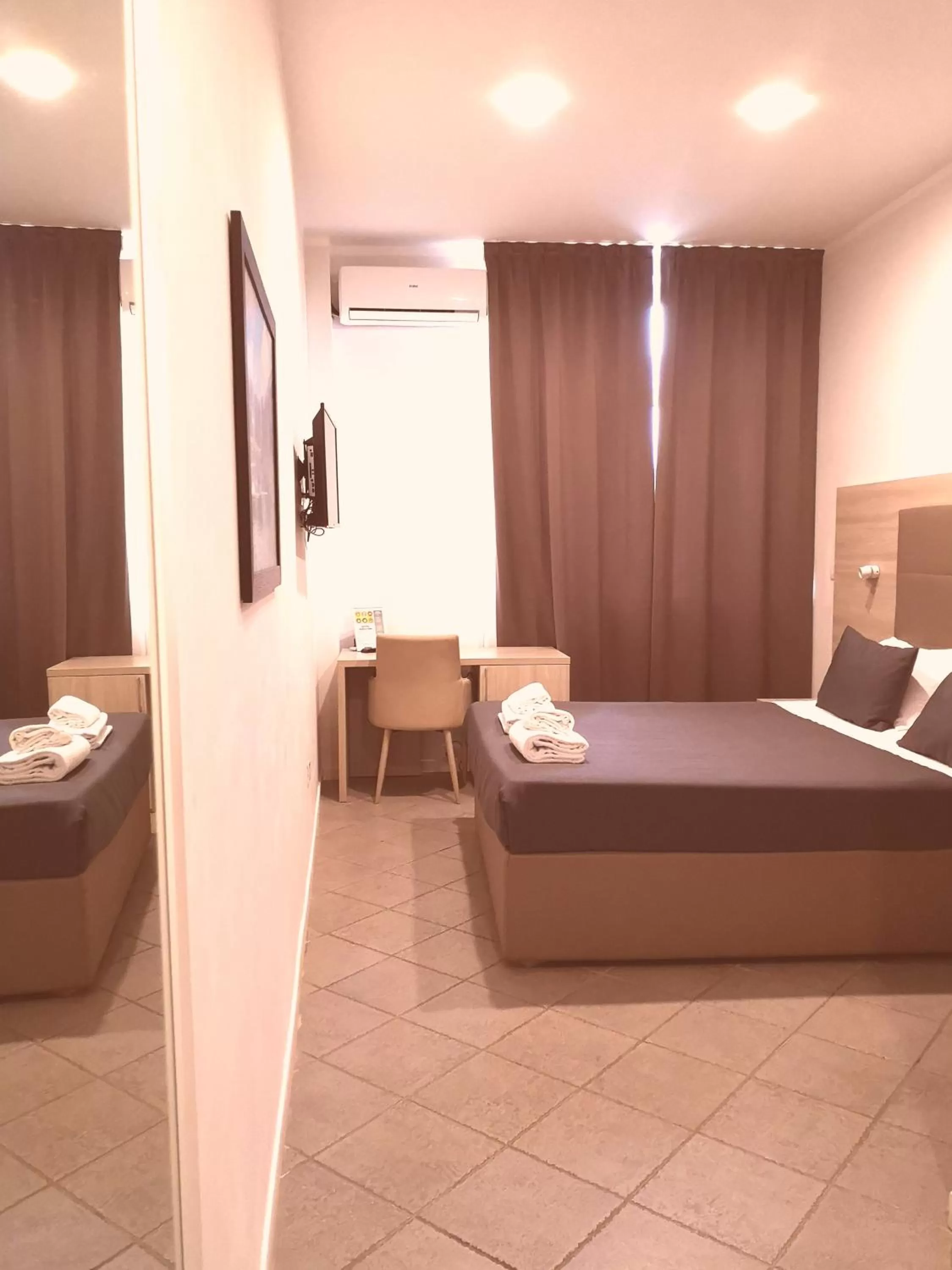 Bed in Academy Hotel