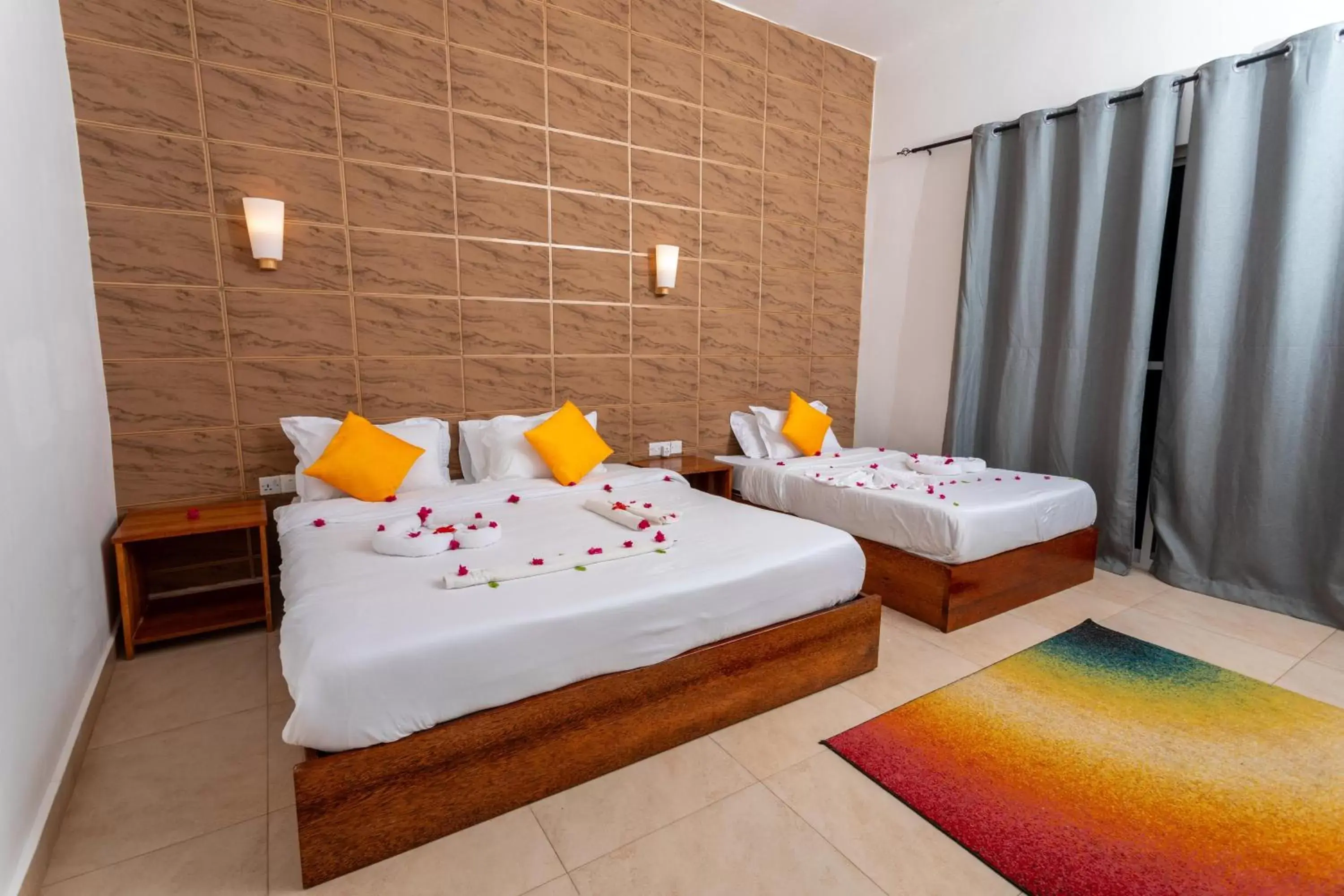 Bed in Canary Nungwi Hotel & Free SPA