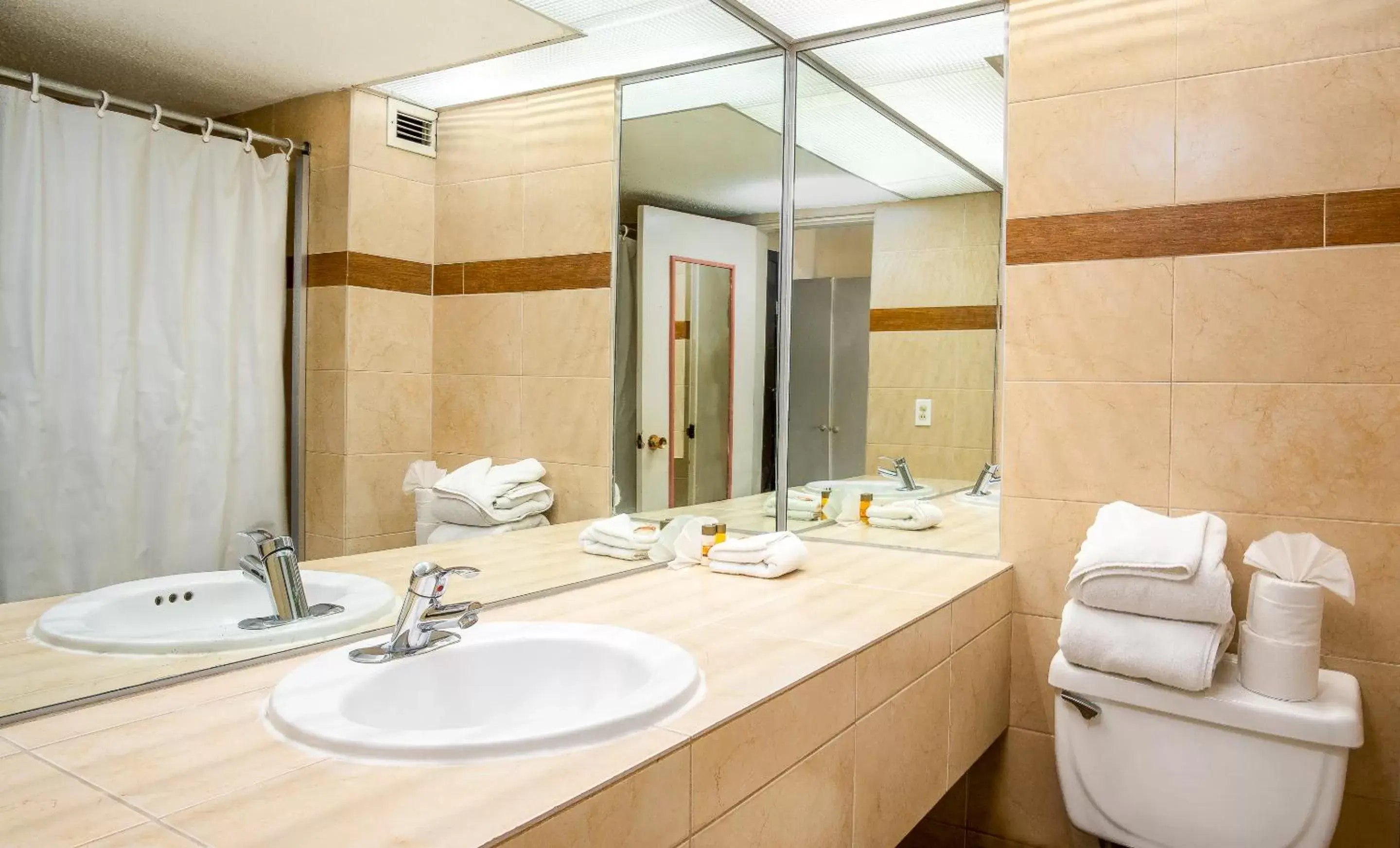 Toilet, Bathroom in Puerto Nuevo Baja Hotel & Villas