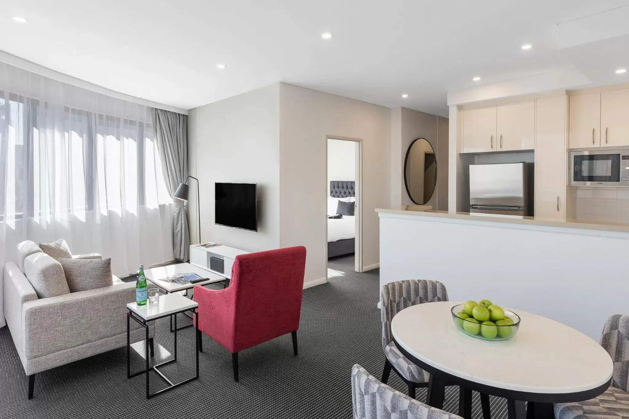Bed, Seating Area in Meriton Suites Kent Street, Sydney