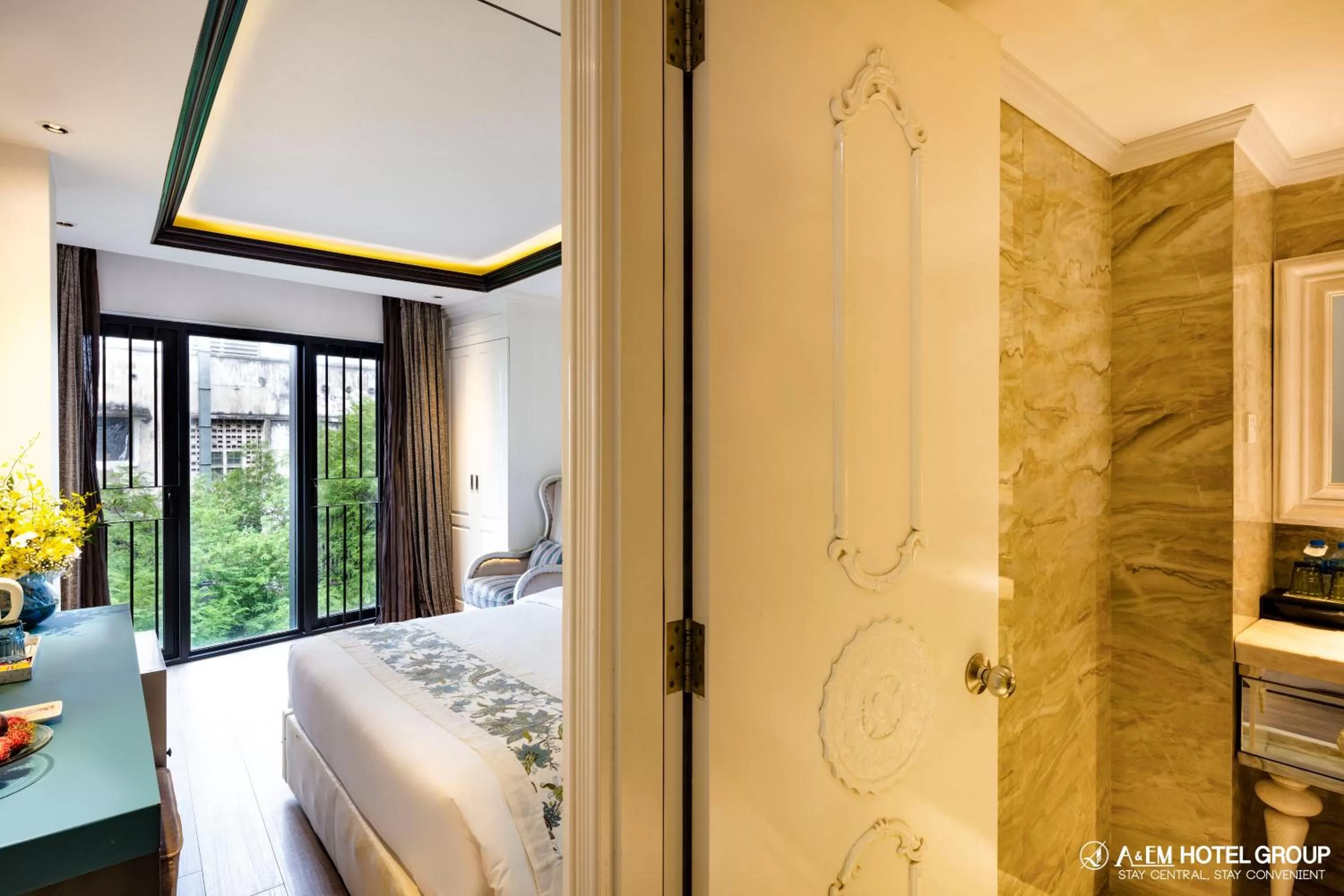 Bedroom, Bathroom in A&EM Saigon Hotel