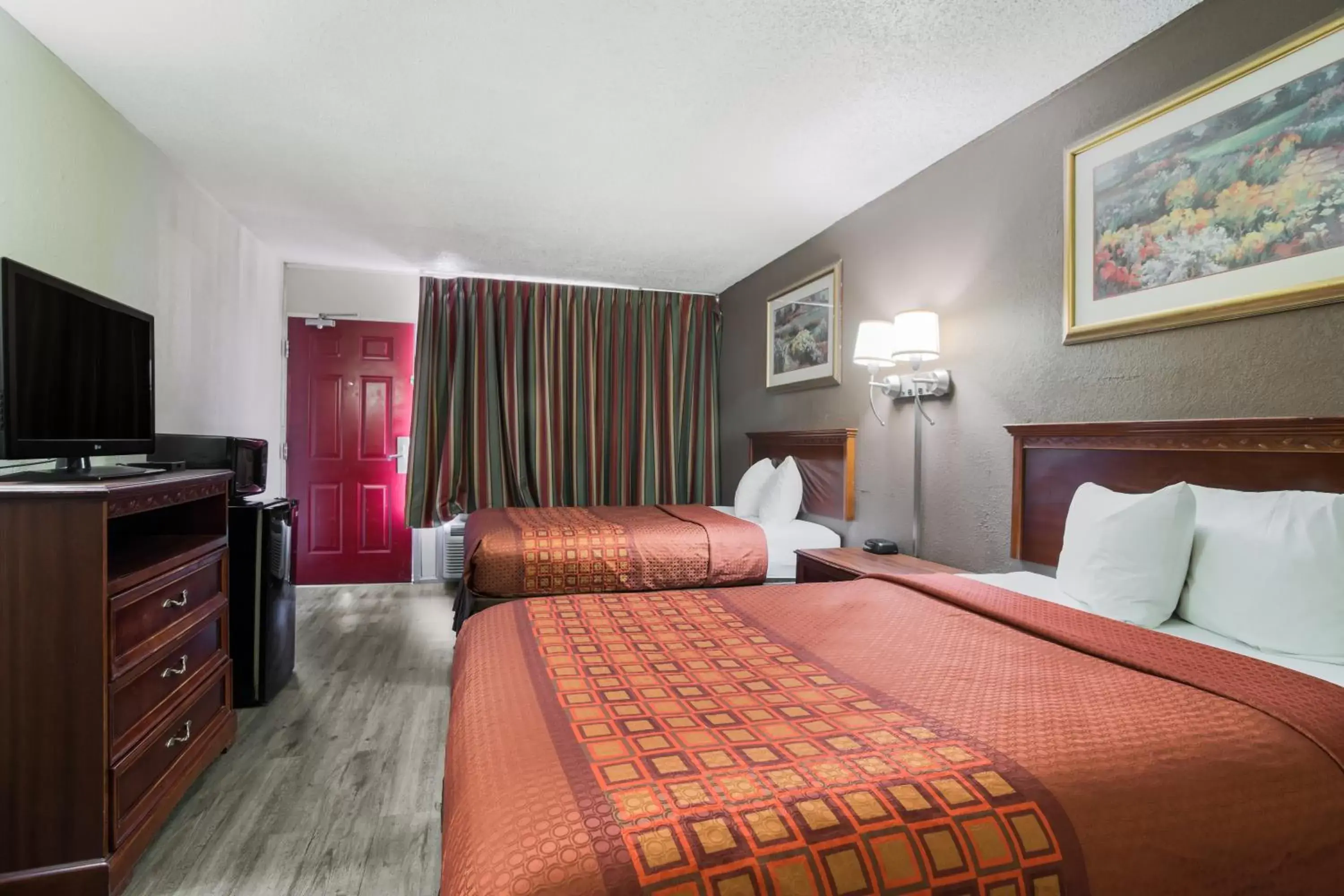 Bedroom, Bed in Americas Best Value Inn Tulsa I-44