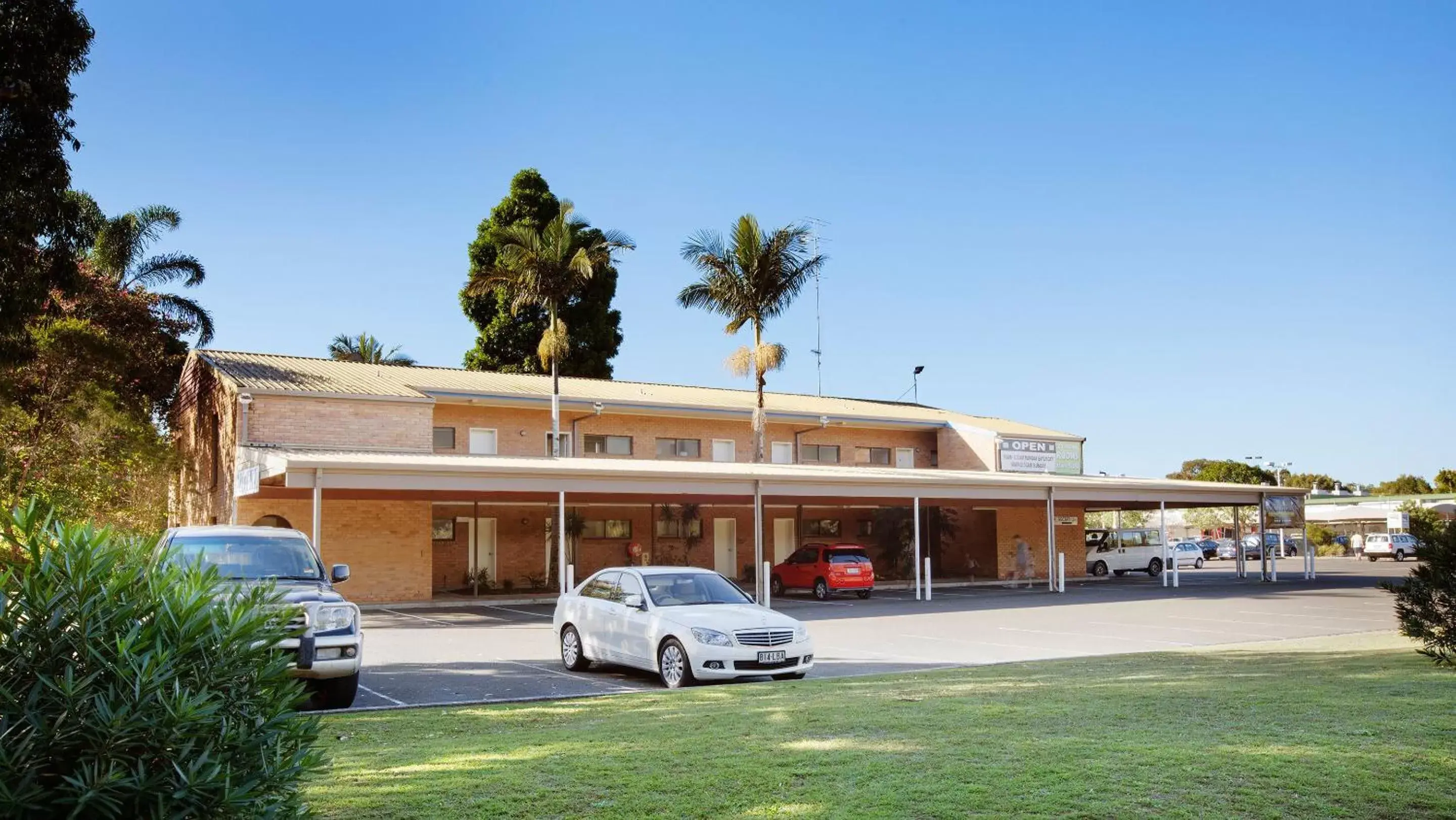 Facade/entrance, Property Building in Villa Noosa Hotel