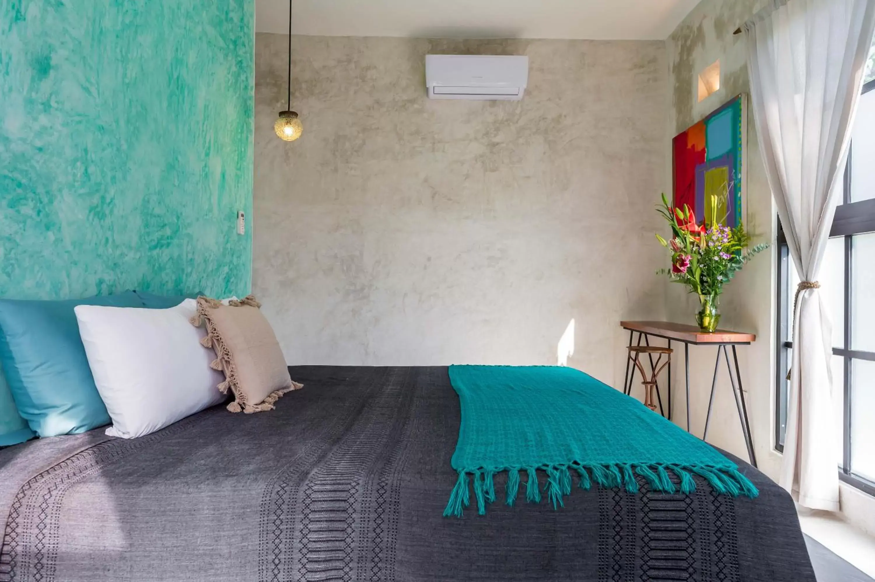 Bed in Turquoise Tulum Hotel