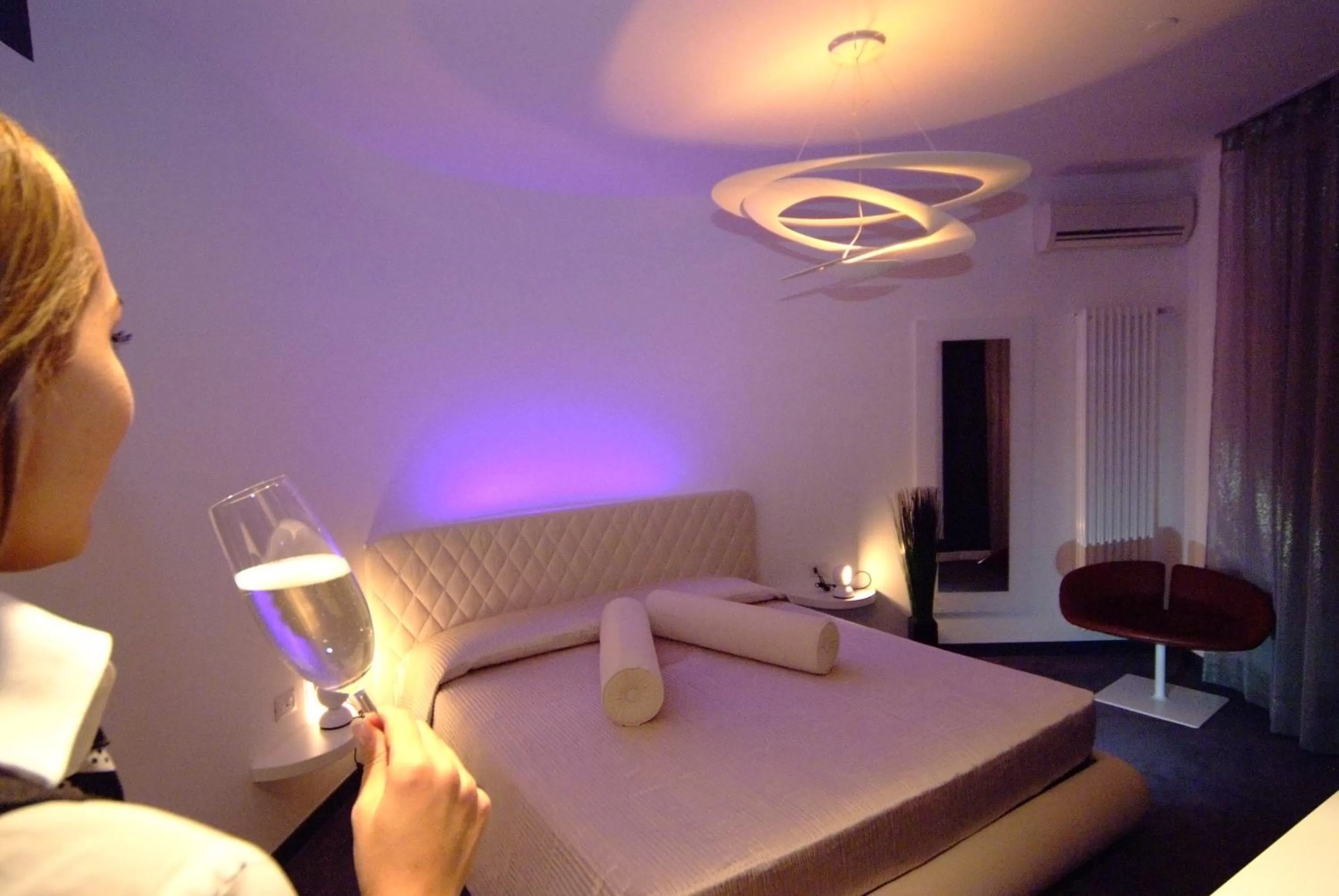 Photo of the whole room, Bed in Design Suite Tirano