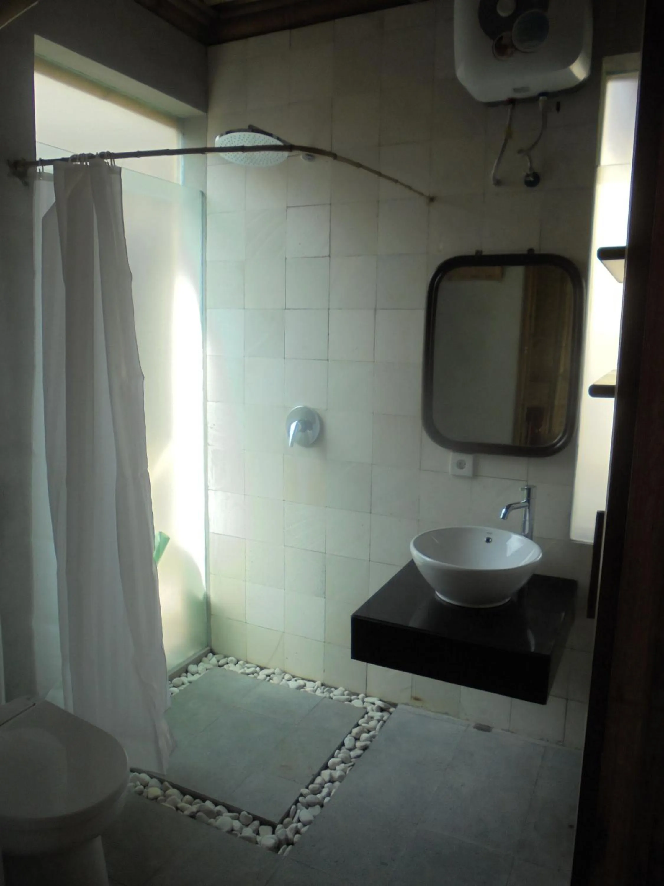 Bathroom in Biyukukung Suite & Spa