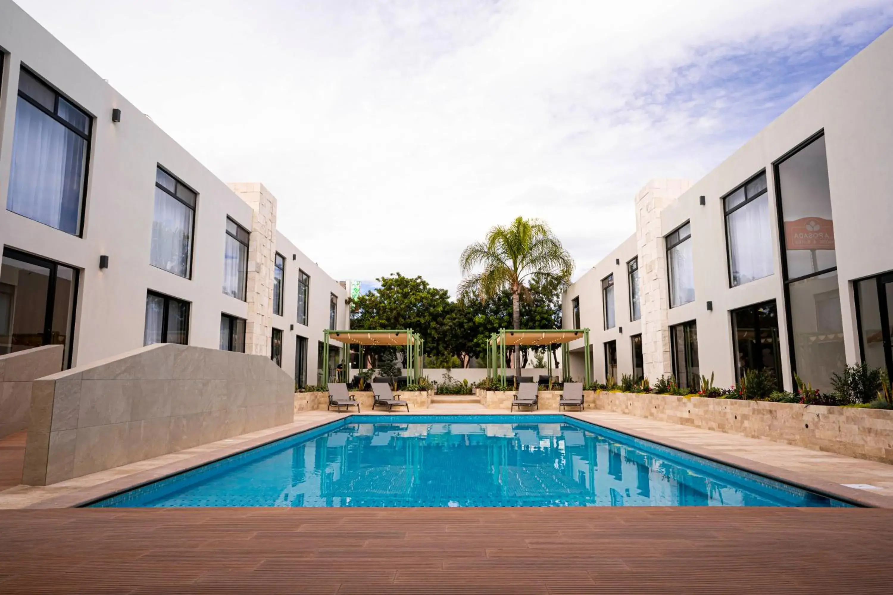 Swimming Pool in La Posada Hotel y Suites