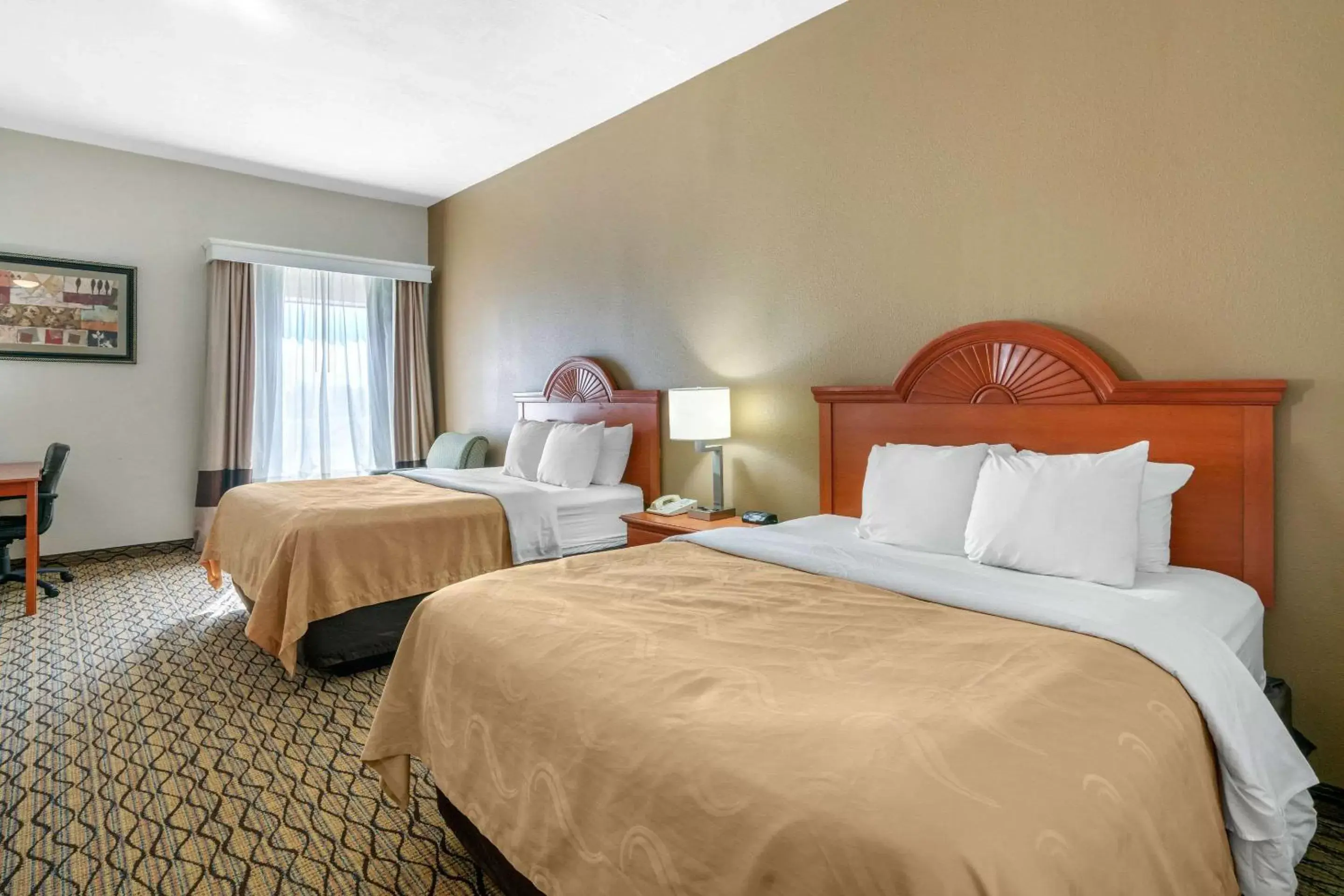 Photo of the whole room, Bed in Quality Inn & Suites - Jefferson City