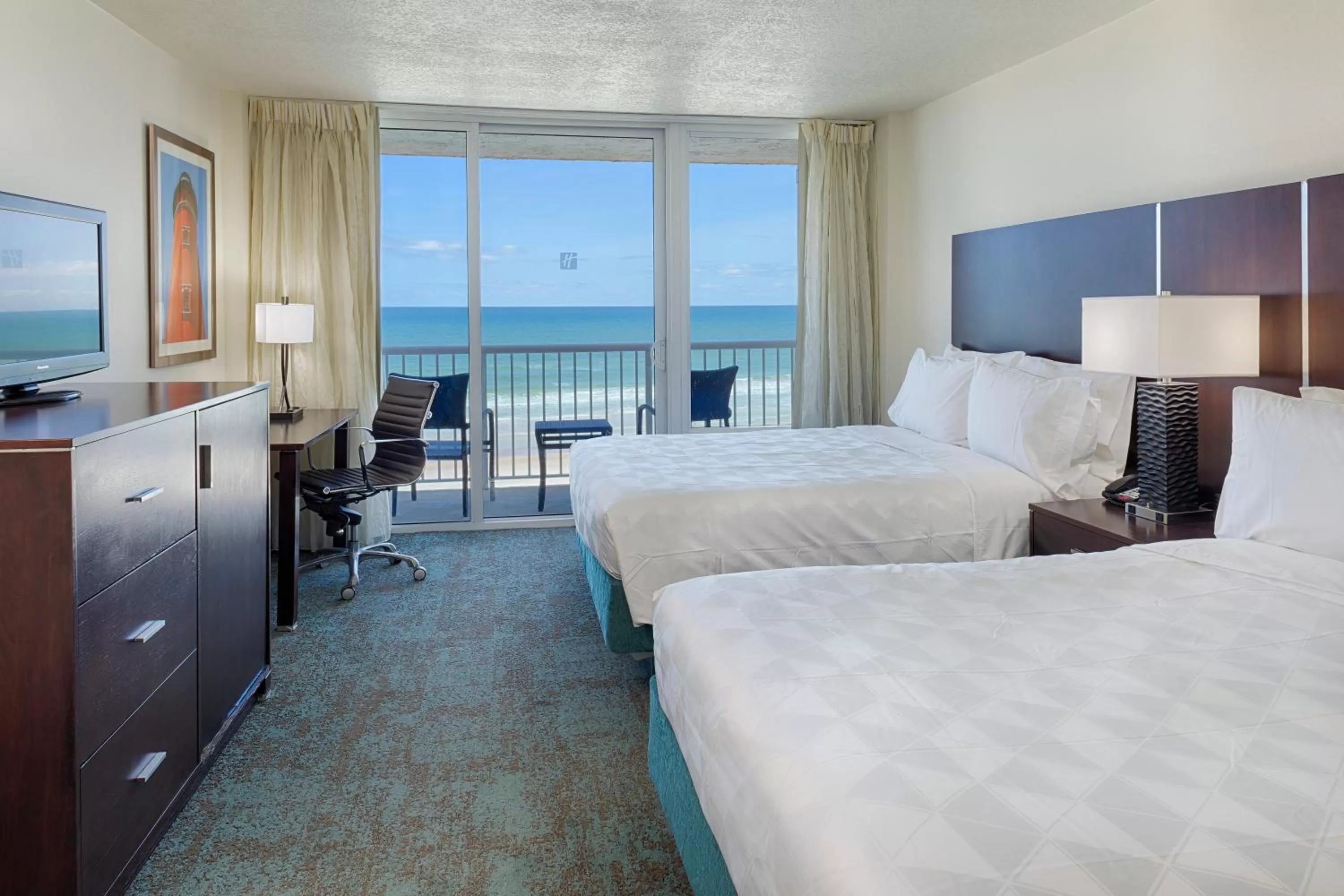 Photo of the whole room, Bed in Holiday Inn Resort Daytona Beach Oceanfront by IHG
