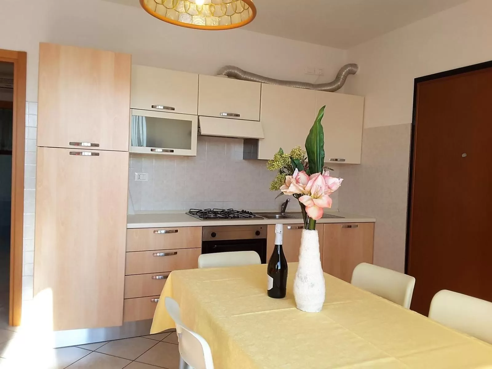 Kitchen/Kitchenette in Villaggio dei Fiori Apart- Hotel 3 Stars - Family Resort