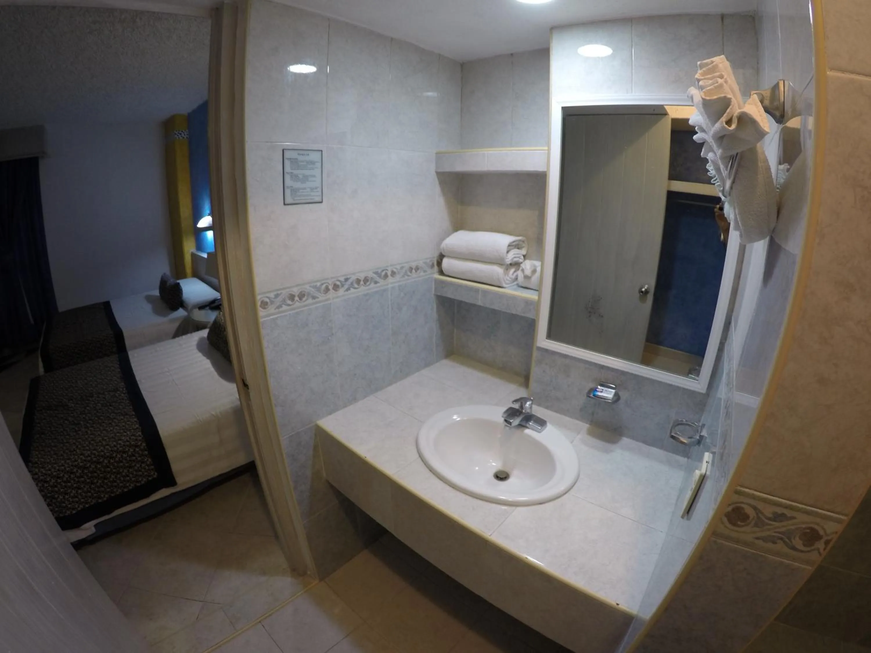 Bathroom, Bed in Hotel Club del Sol Acapulco by NG Hoteles