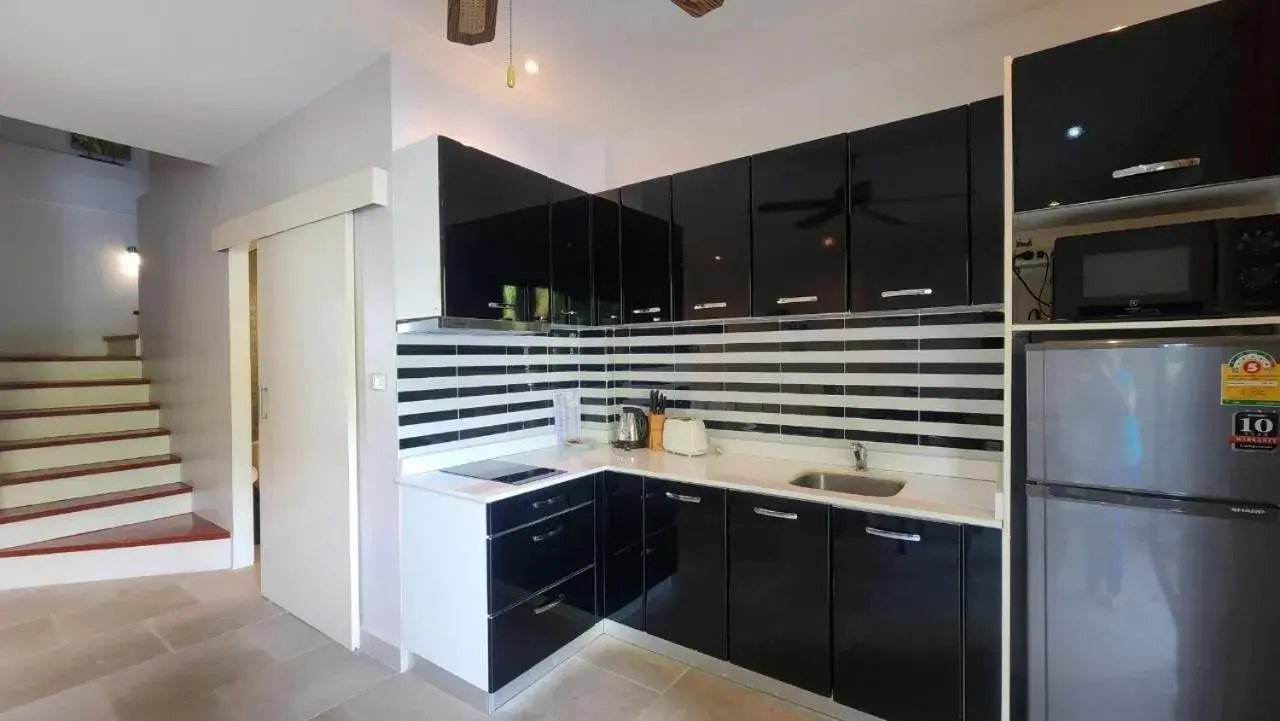 Kitchen/Kitchenette in Oasis Garden & Pool Villa at VIP Resort