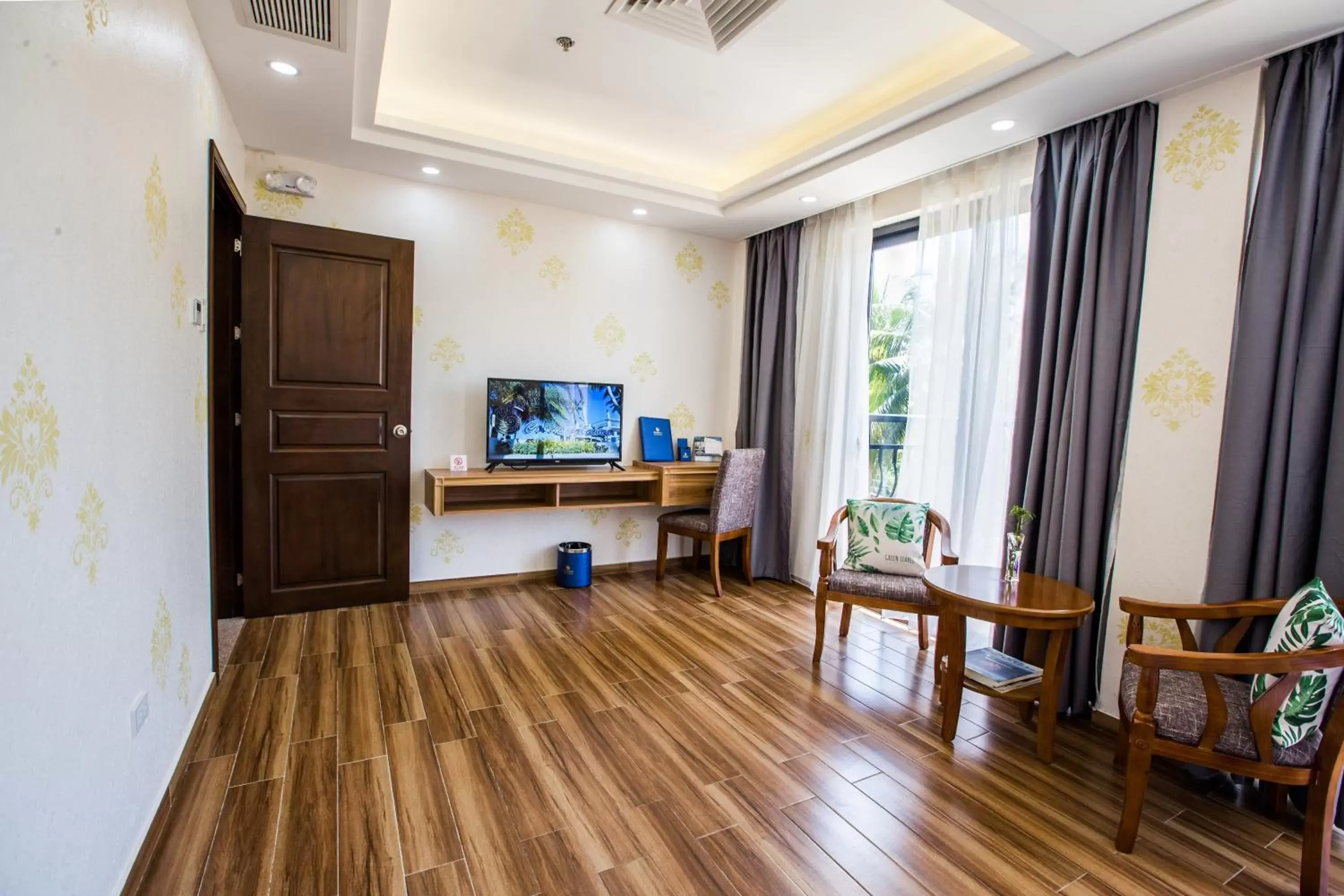 Seating area, TV/Entertainment Center in Costa Palawan Resort