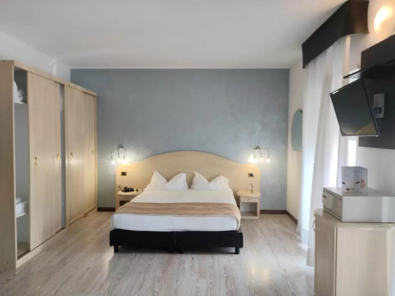 Quadruple Room with Balcony in Hotel Rudy