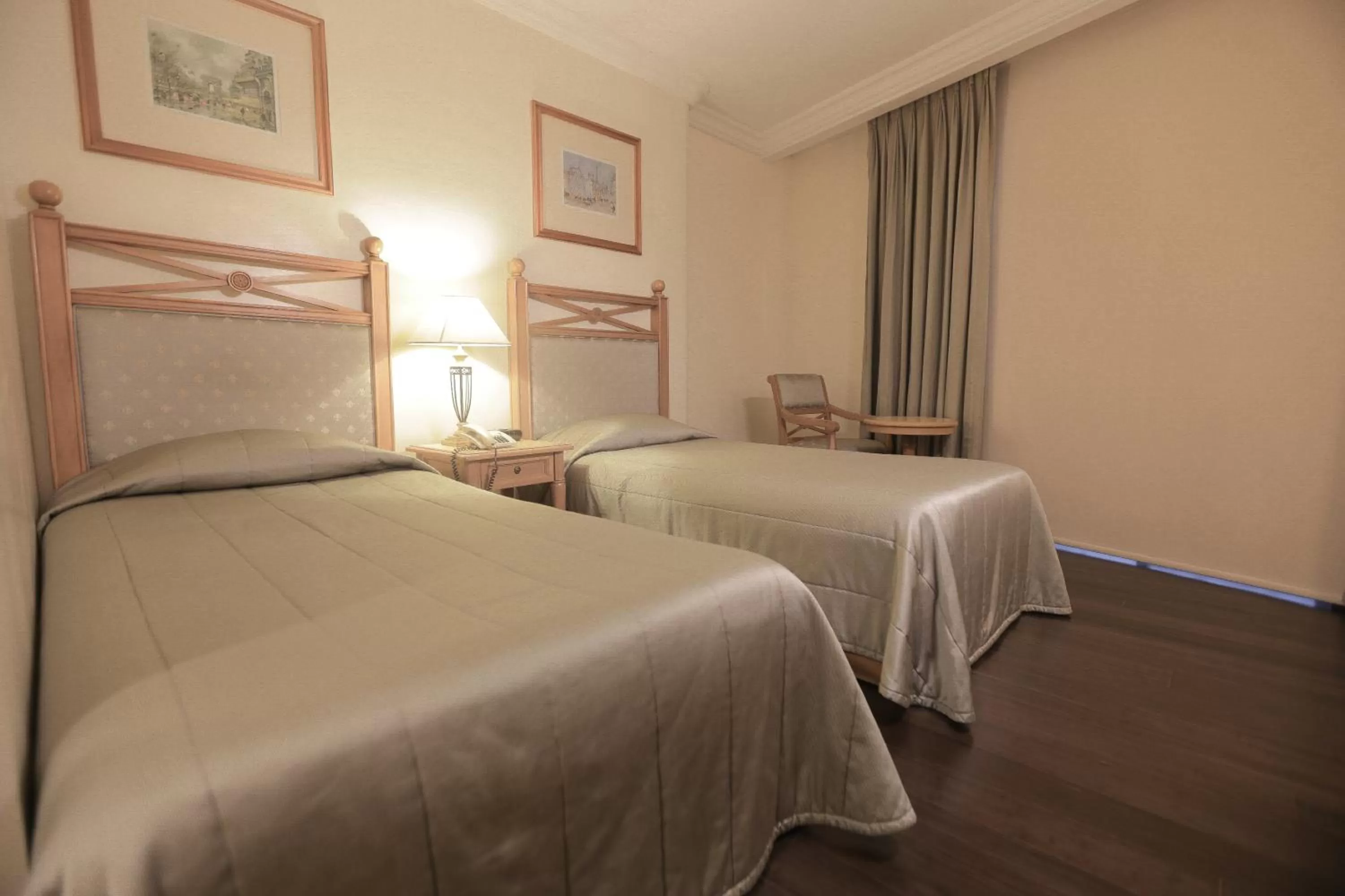 Bed in The Grand Dame Hotel