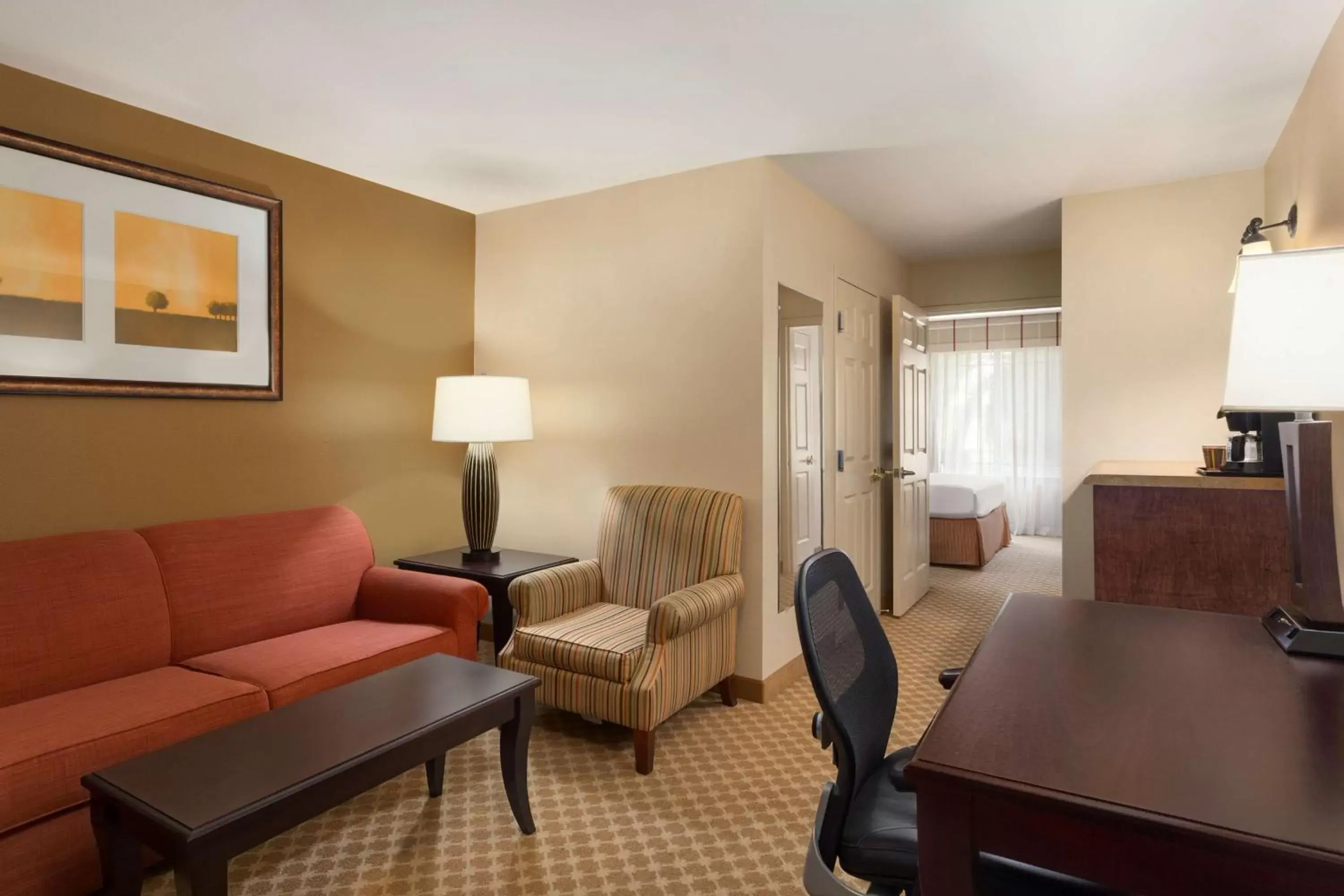 Photo of the whole room, Seating Area in Country Inn & Suites by Radisson, Ontario at Ontario Mills, CA