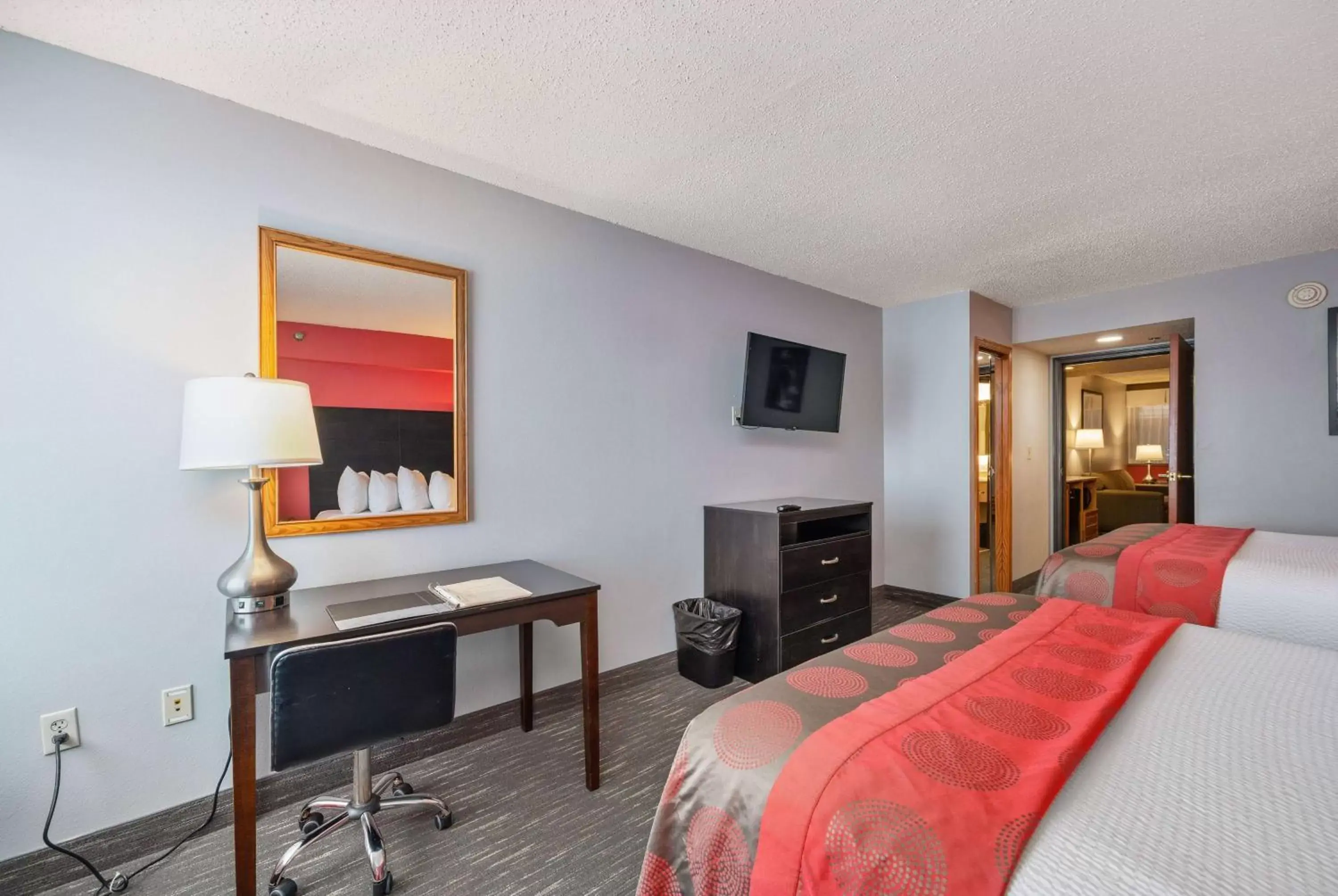 Photo of the whole room, Bed in Ramada by Wyndham Sioux Falls Airport - Waterpark Resort & Event Center