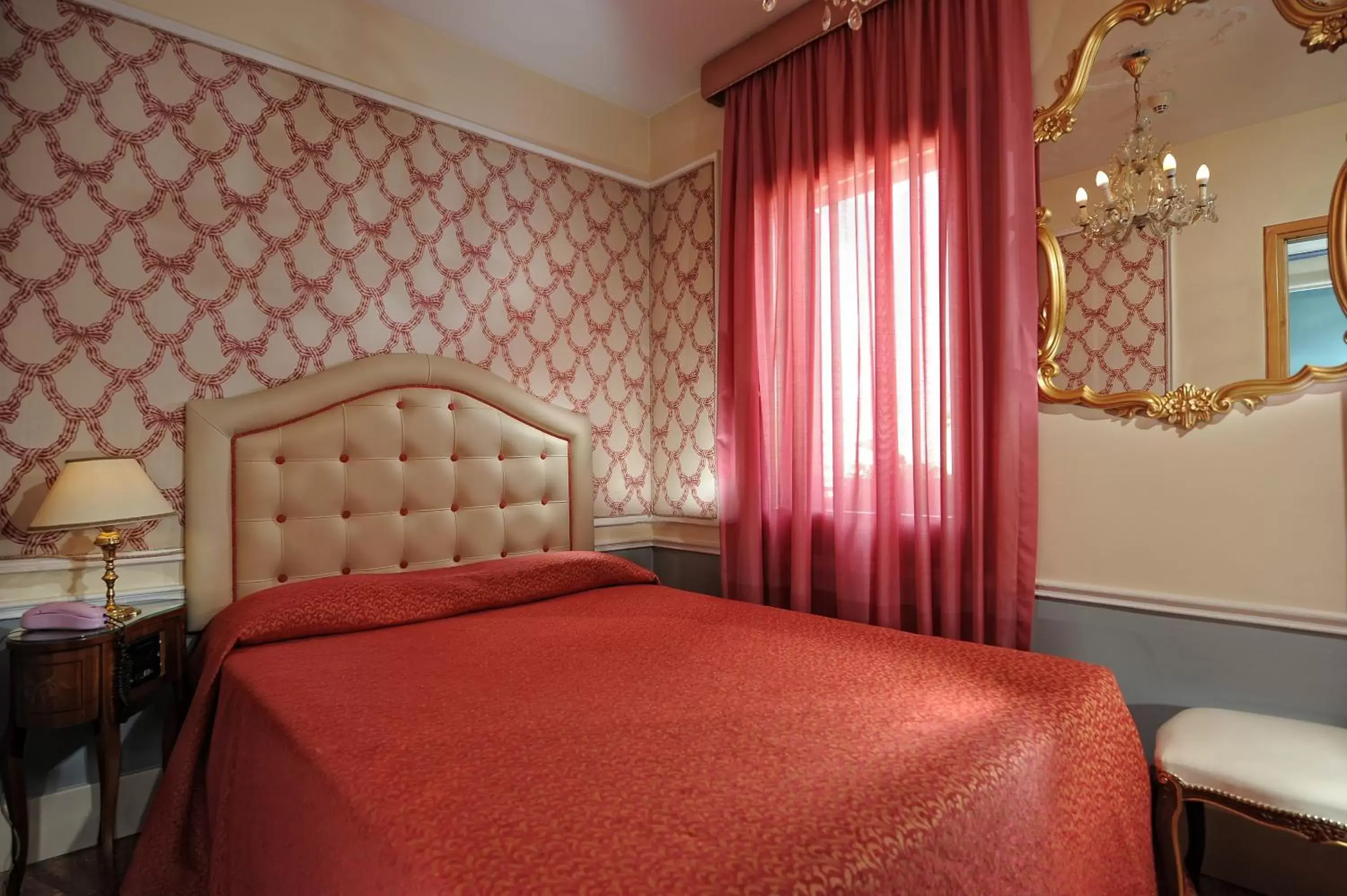 Bed in Hotel Arlecchino