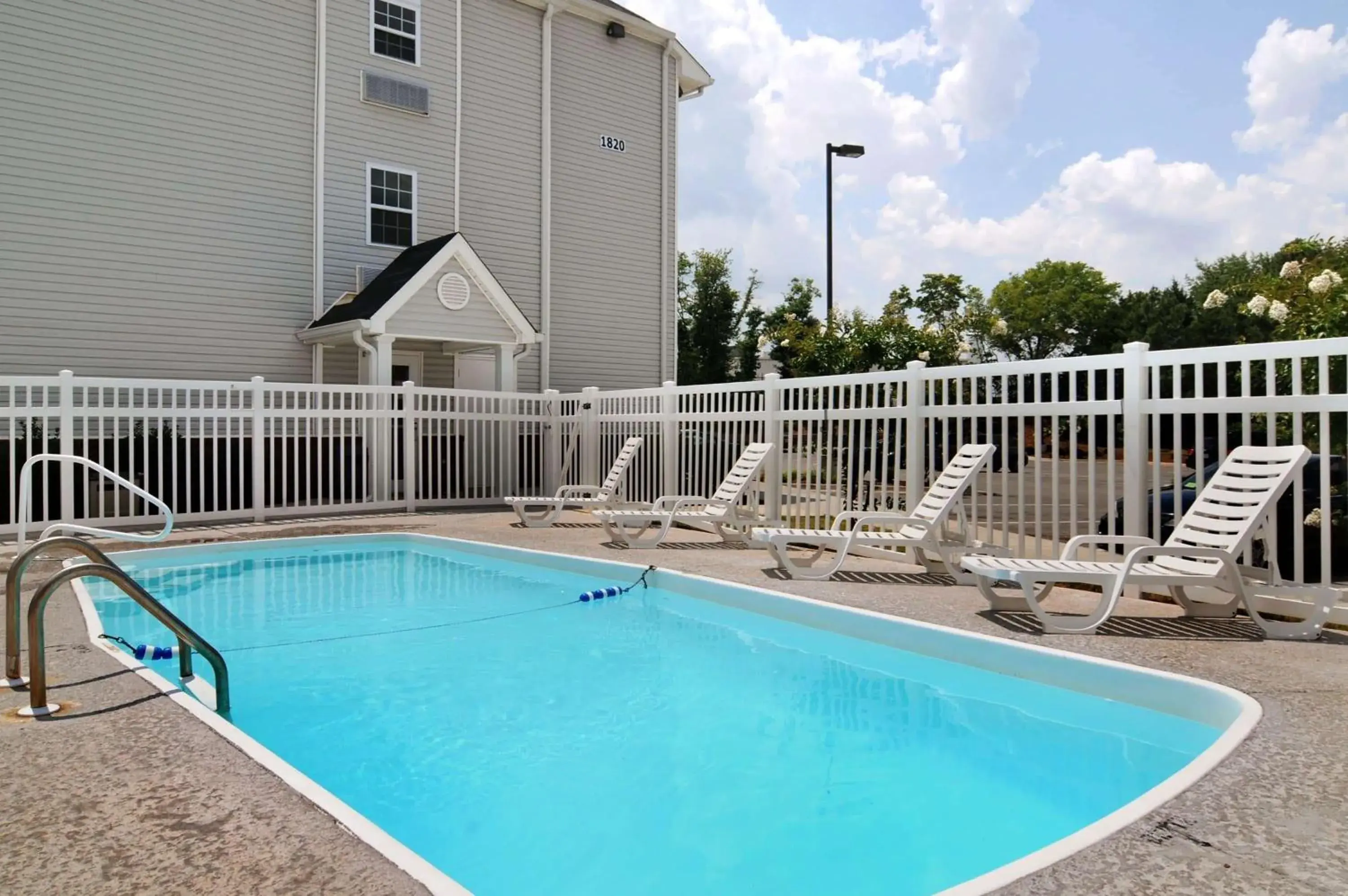 On site, Swimming Pool in Microtel Inn & Suites Huntsville