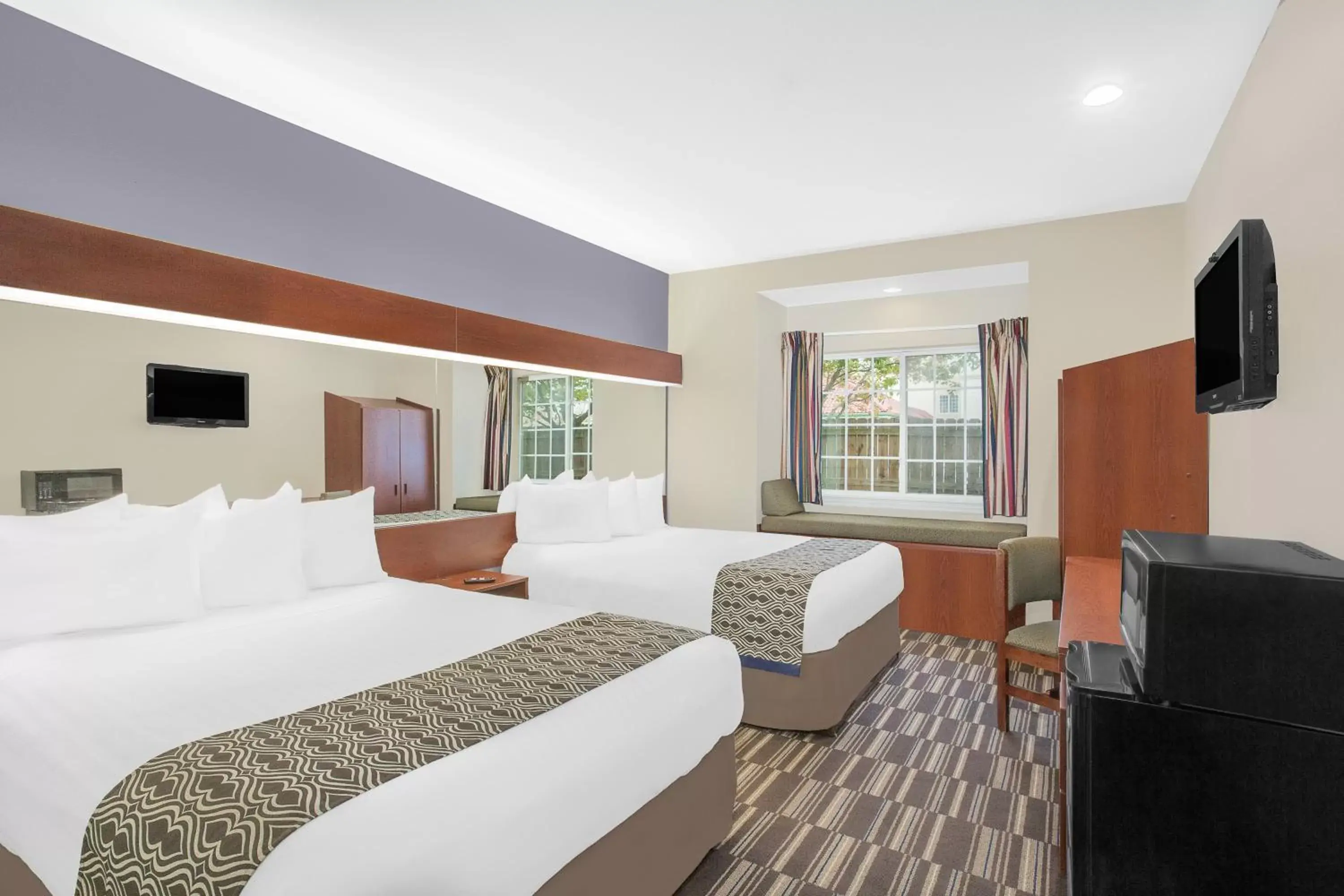 Bedroom, Bed in Microtel by Wyndham Bentonville