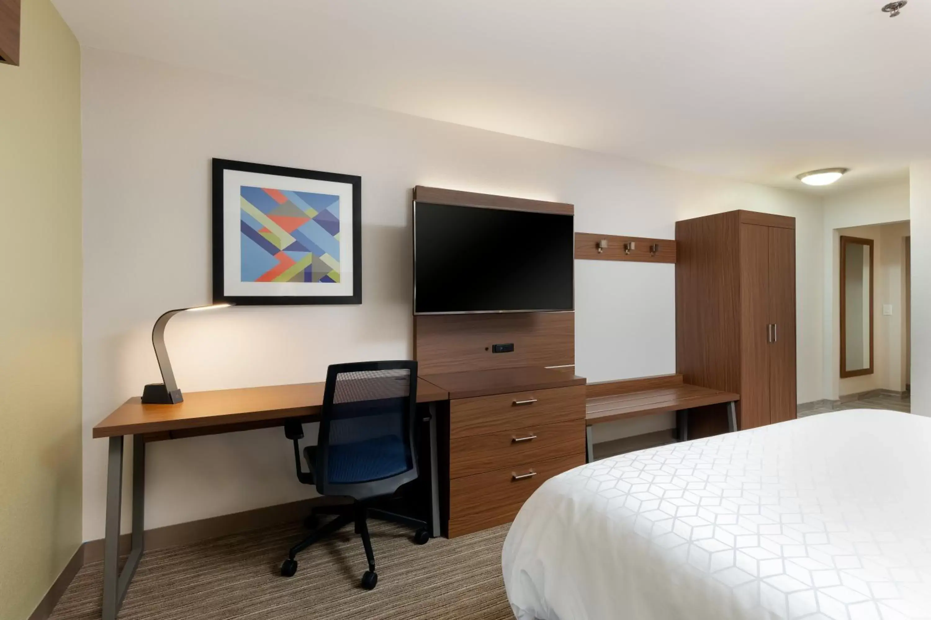 Photo of the whole room, TV/Entertainment Center in Holiday Inn Express Alpharetta - Roswell, an IHG Hotel