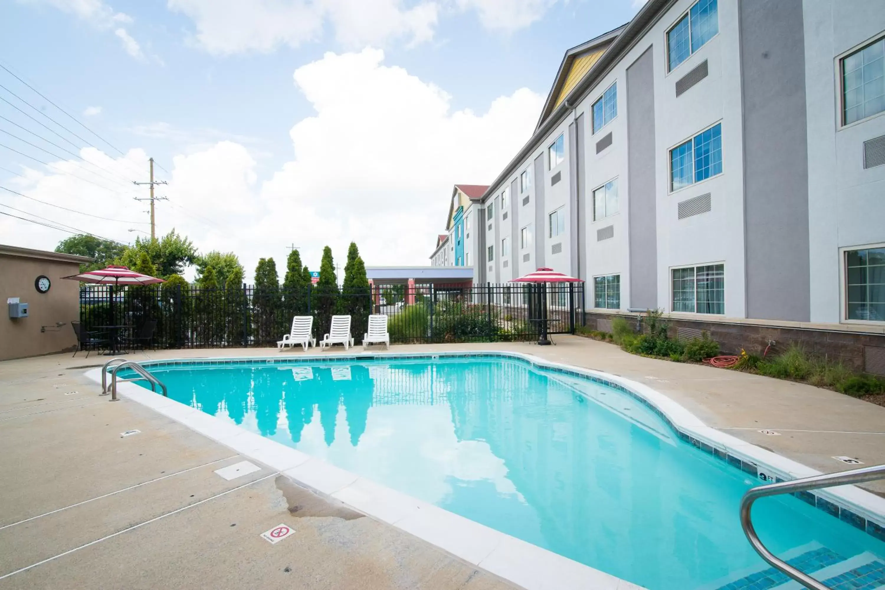 Swimming Pool in SureStay Plus by Best Western Louisville Airport Expo