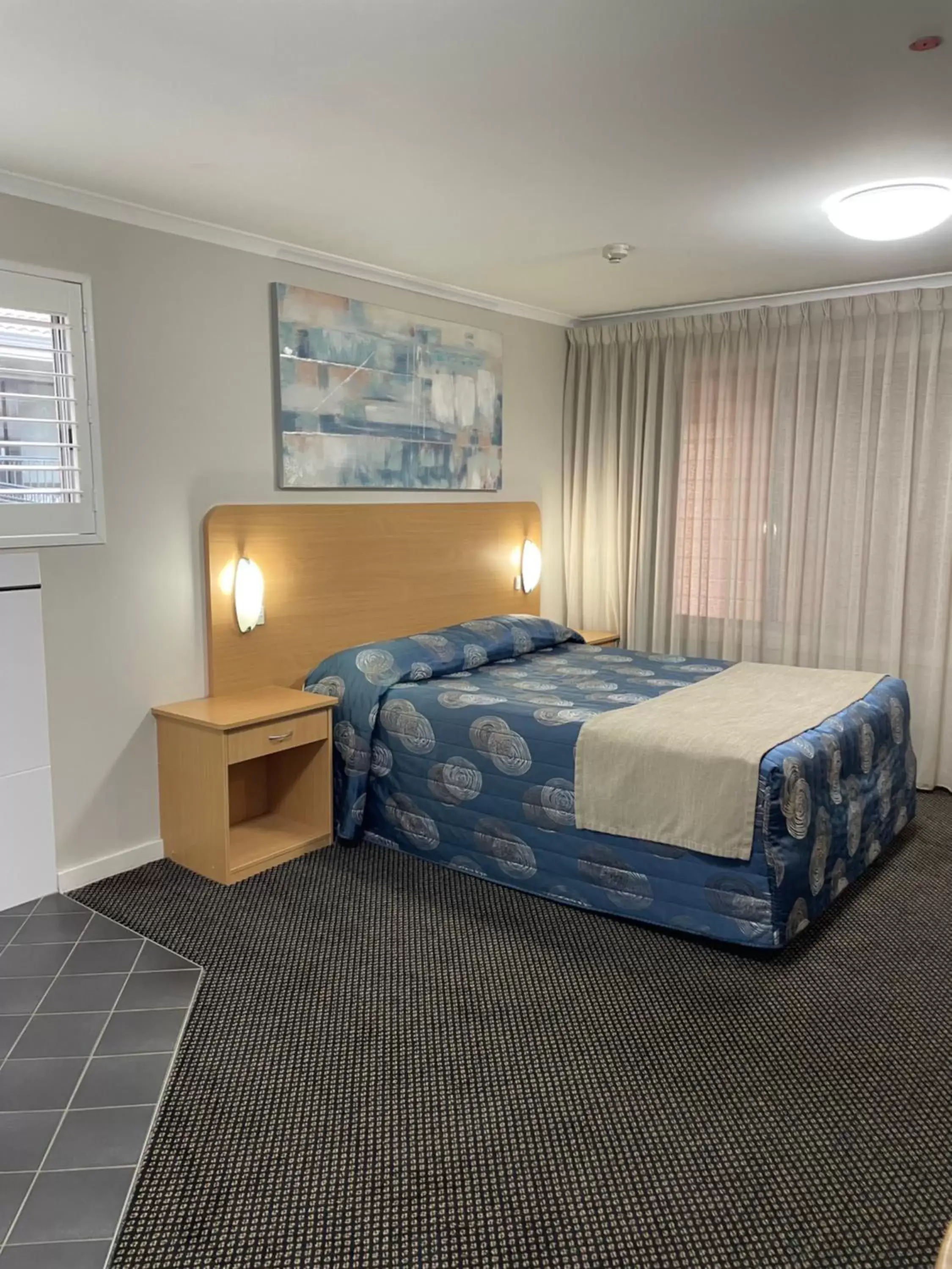 Bed in Cattlemans Country Motor Inn & Serviced Apartments