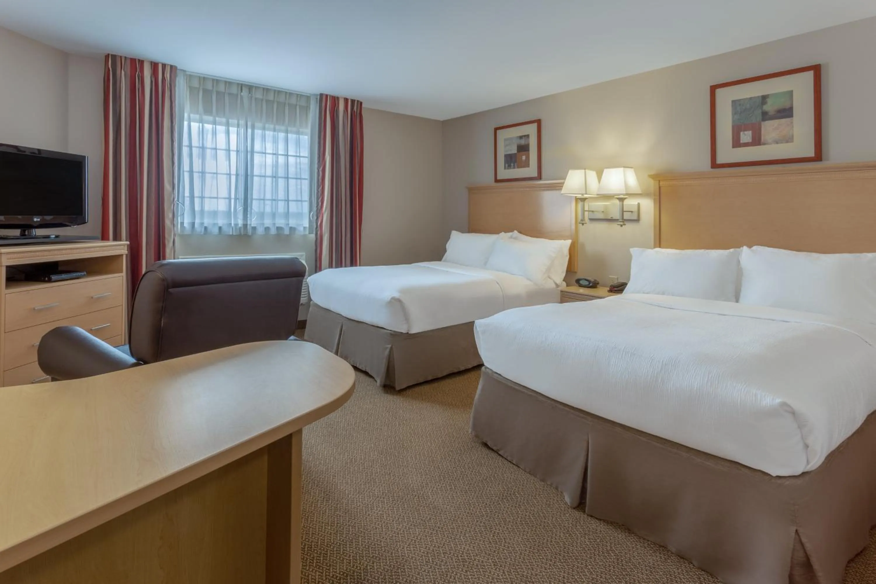 Photo of the whole room, Bed in Candlewood Suites Minot by IHG