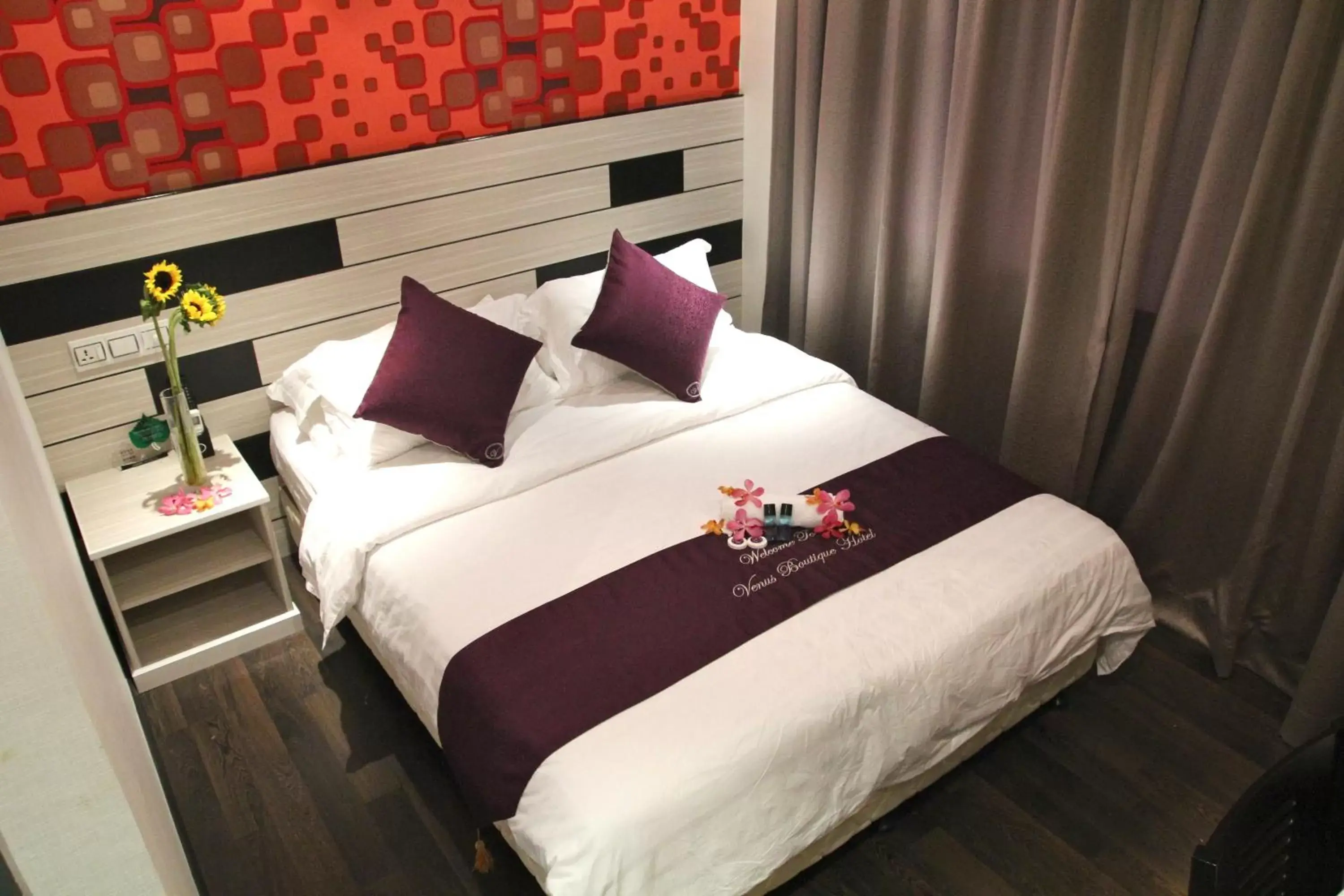 Bed in Venus Boutique Hotel