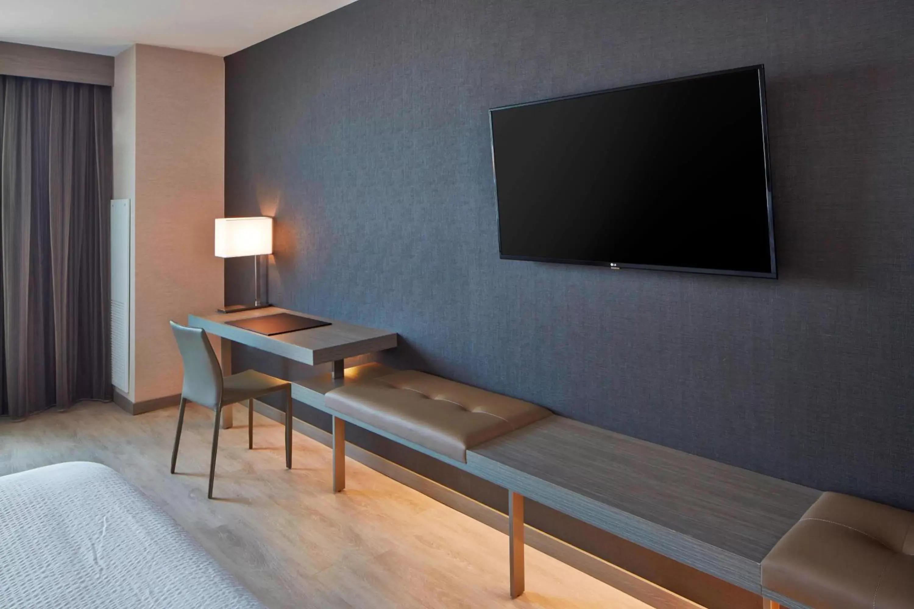 Photo of the whole room, TV/Entertainment Center in AC Hotel by Marriott Des Moines East Village
