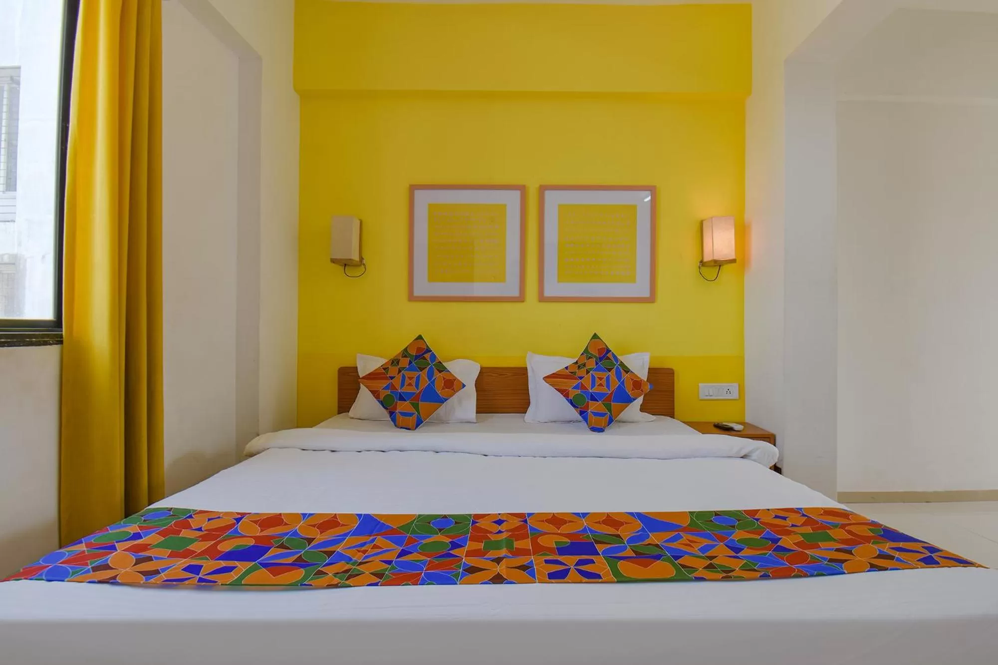 Bed in FabHotel Aakiyo