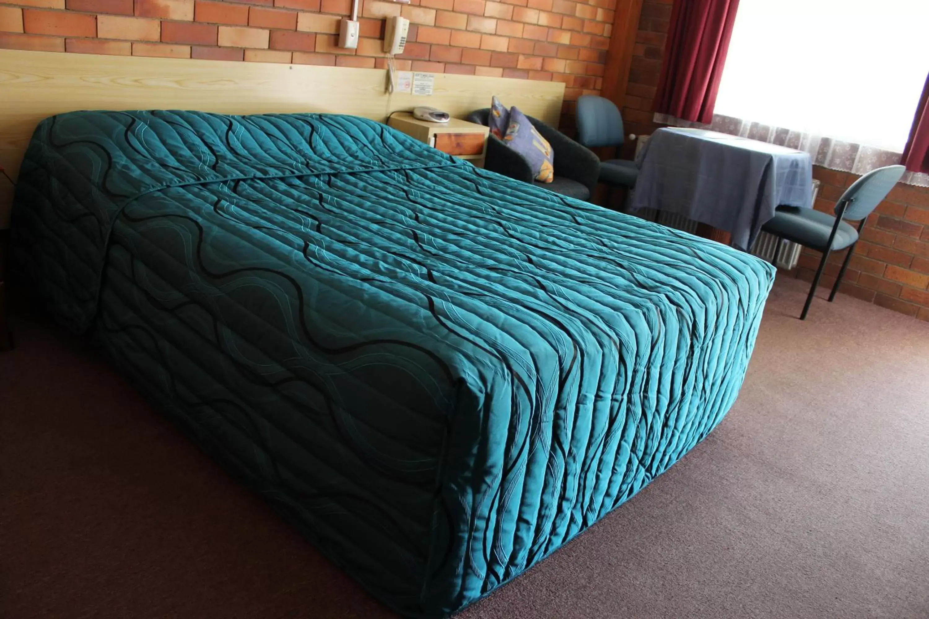 Bedroom, Bed in Glen Innes Lodge Motel
