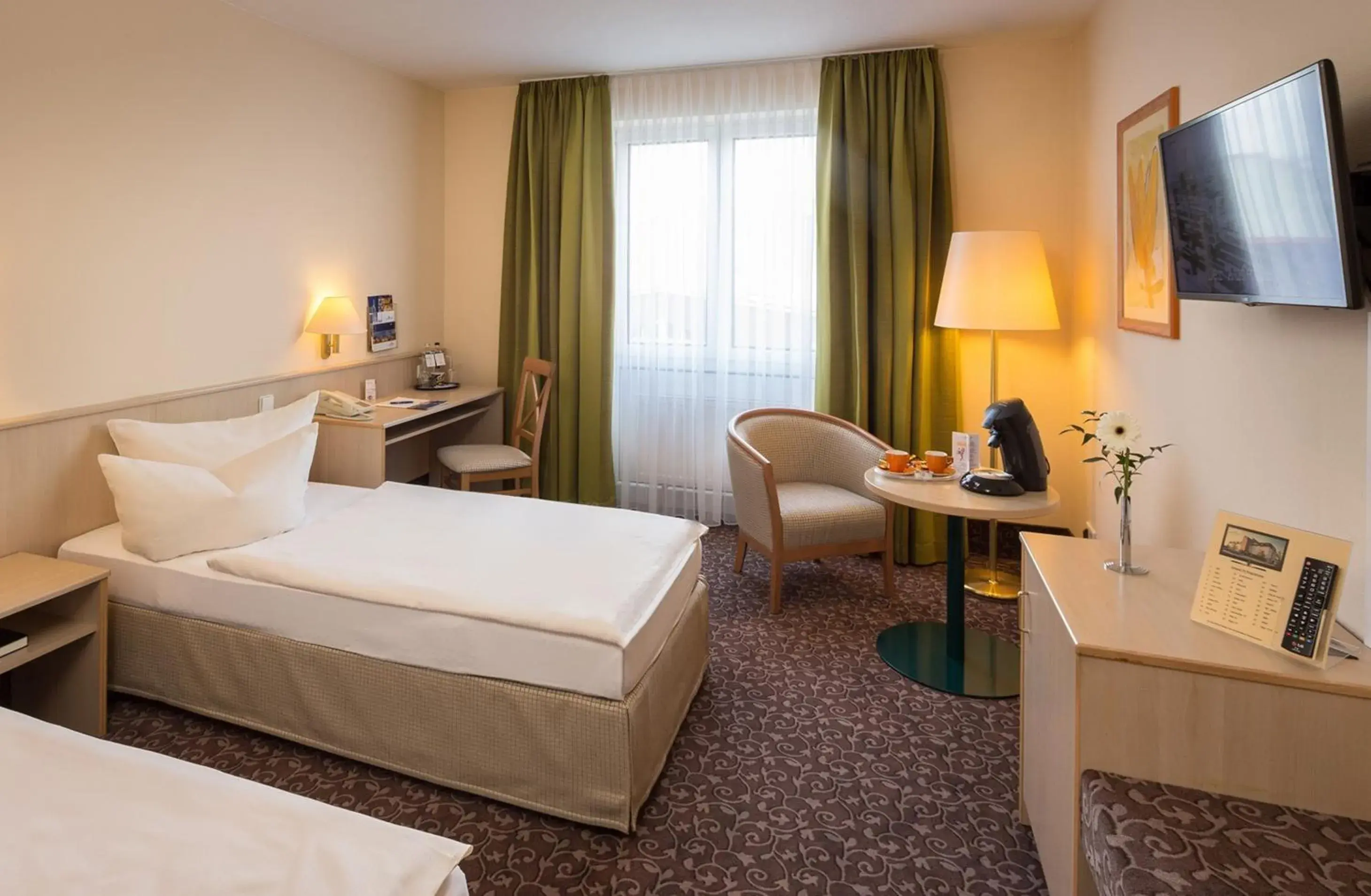 Photo of the whole room, Bed in AMBER HOTEL Chemnitz Park