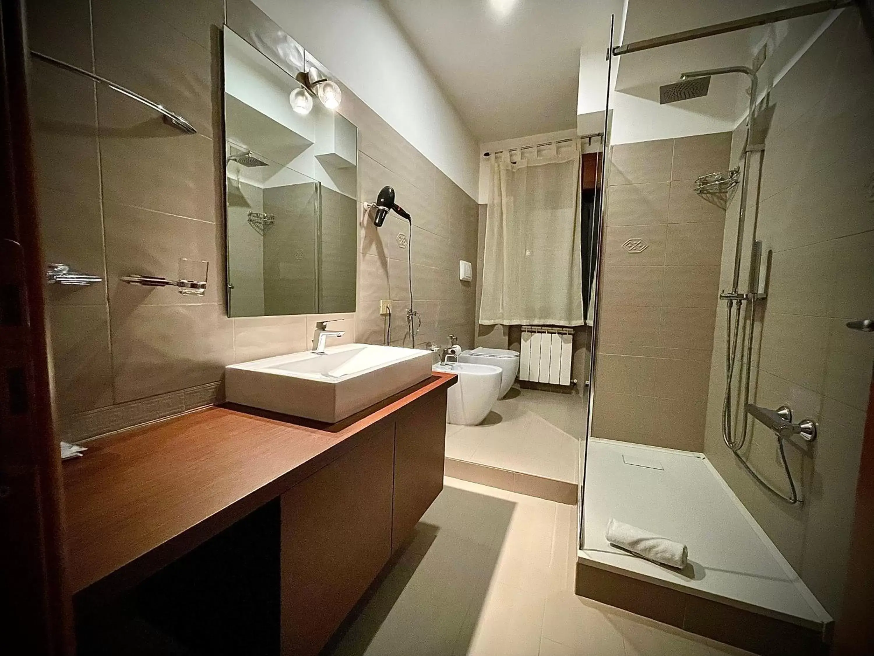 Bathroom in Le Ceramiche - Hotel Residence ed Eventi