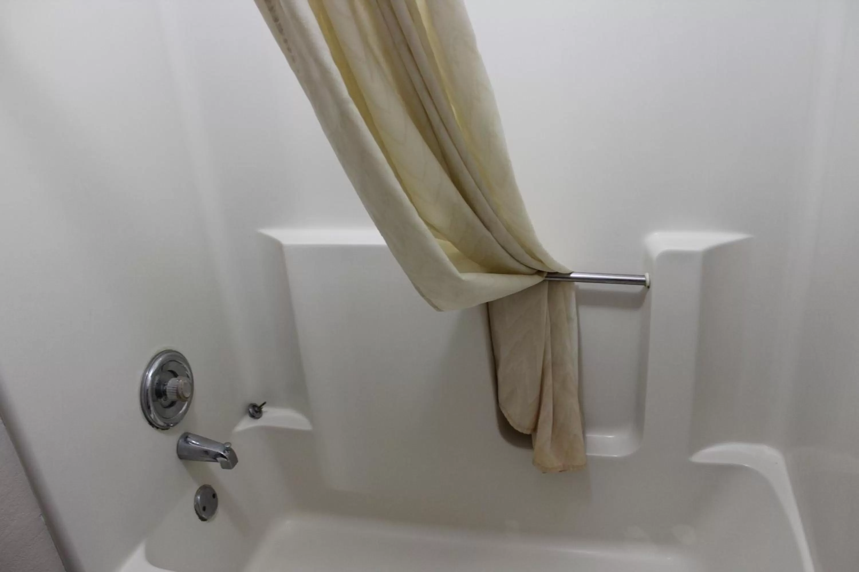 Bathroom in Coratel Inn and Suites Maple Grove