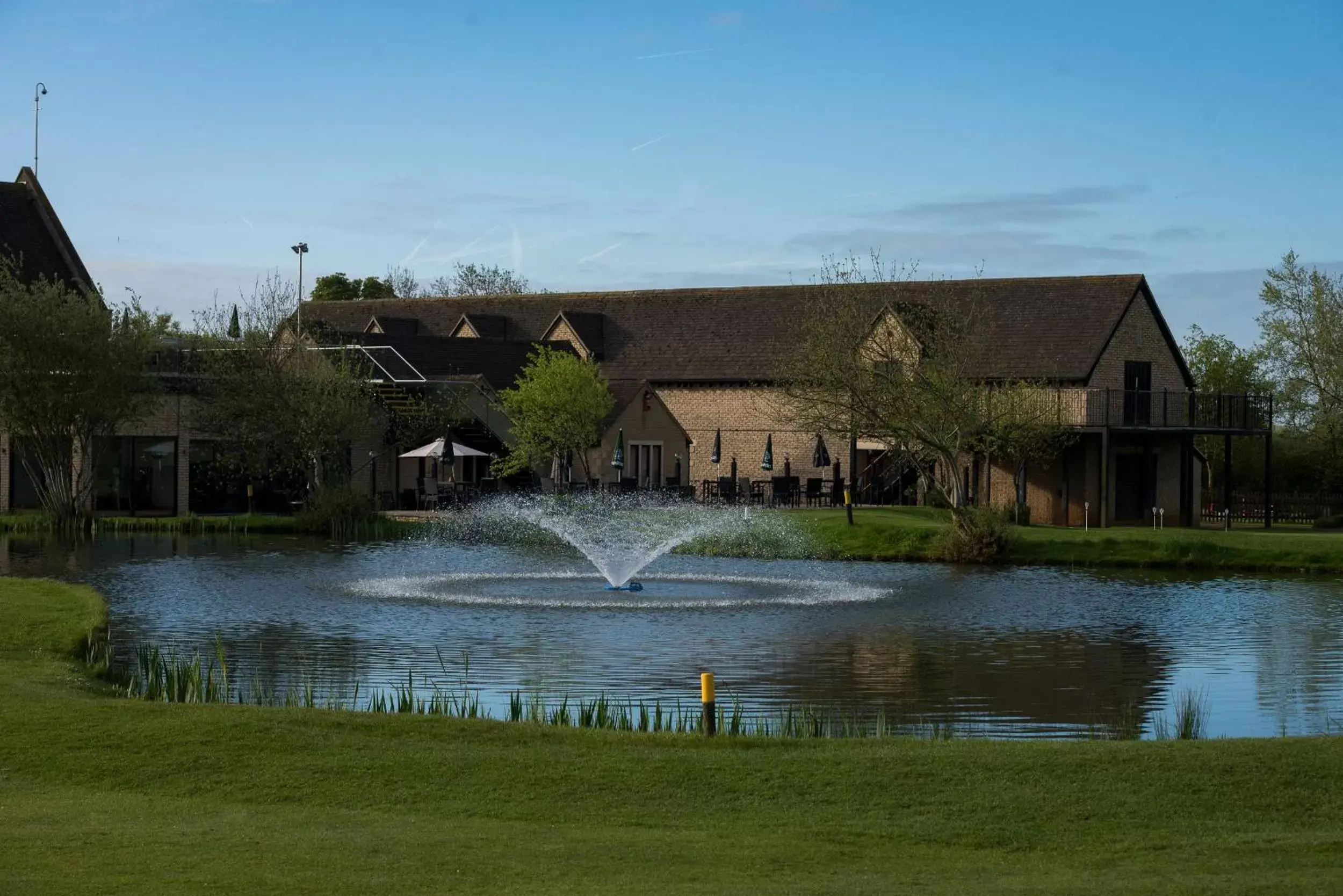 Lake view, Property Building in Bicester Hotel, Golf & Spa