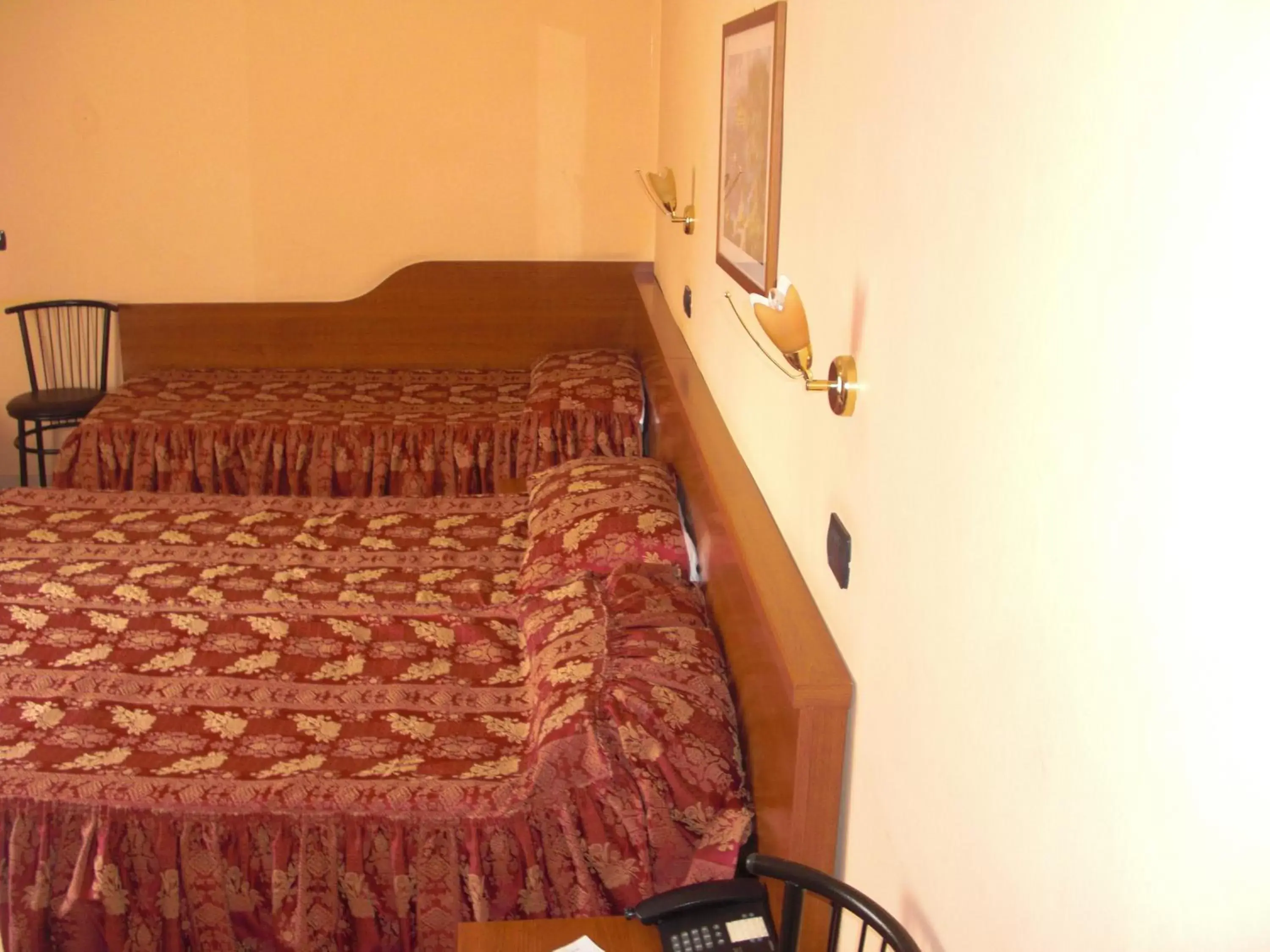 Bed in Hotel Legnano