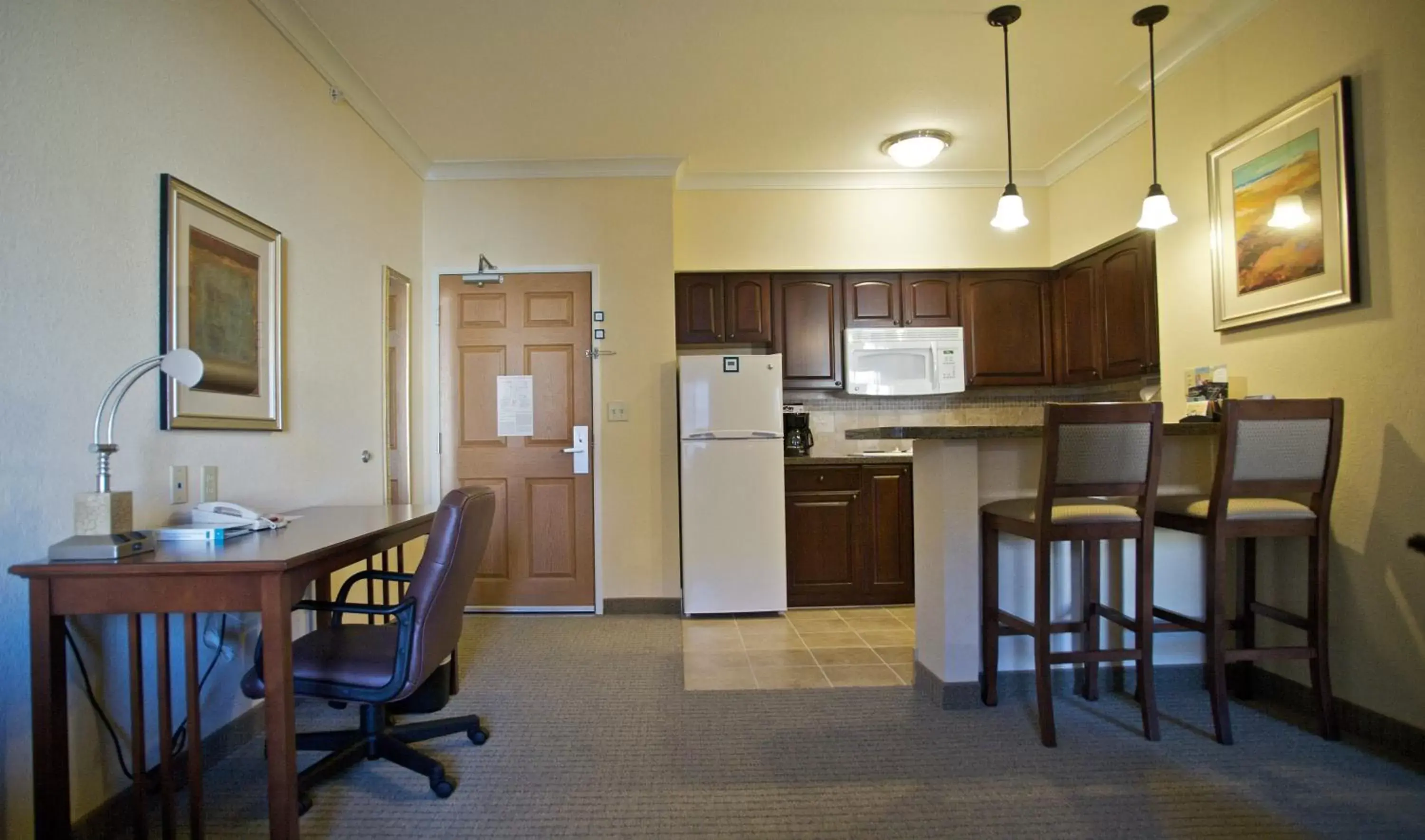 Photo of the whole room, Kitchen/Kitchenette in Staybridge Suites San Antonio Sea World, an IHG Hotel