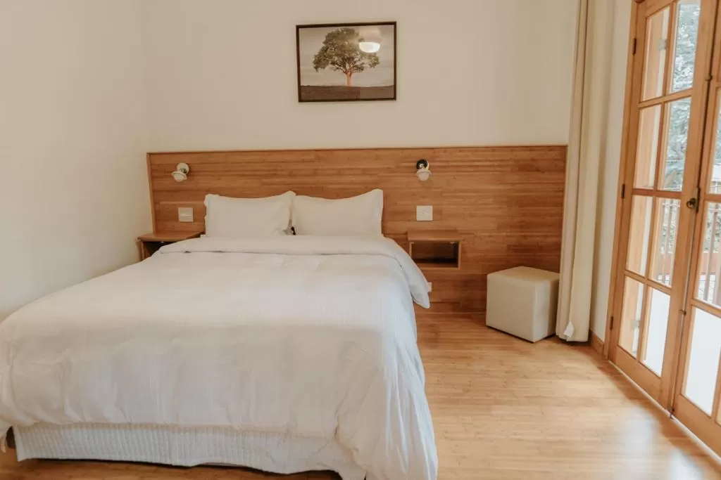 Bed in La Brume Pousada