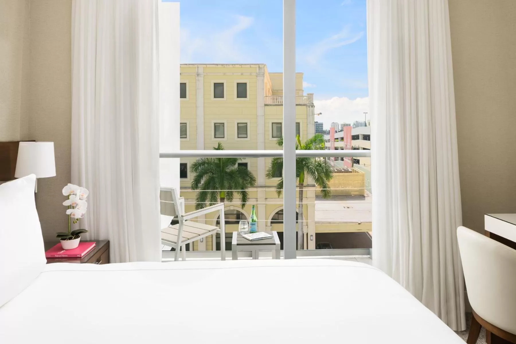 Patio, Bed in The Altair Bay Harbor Hotel
