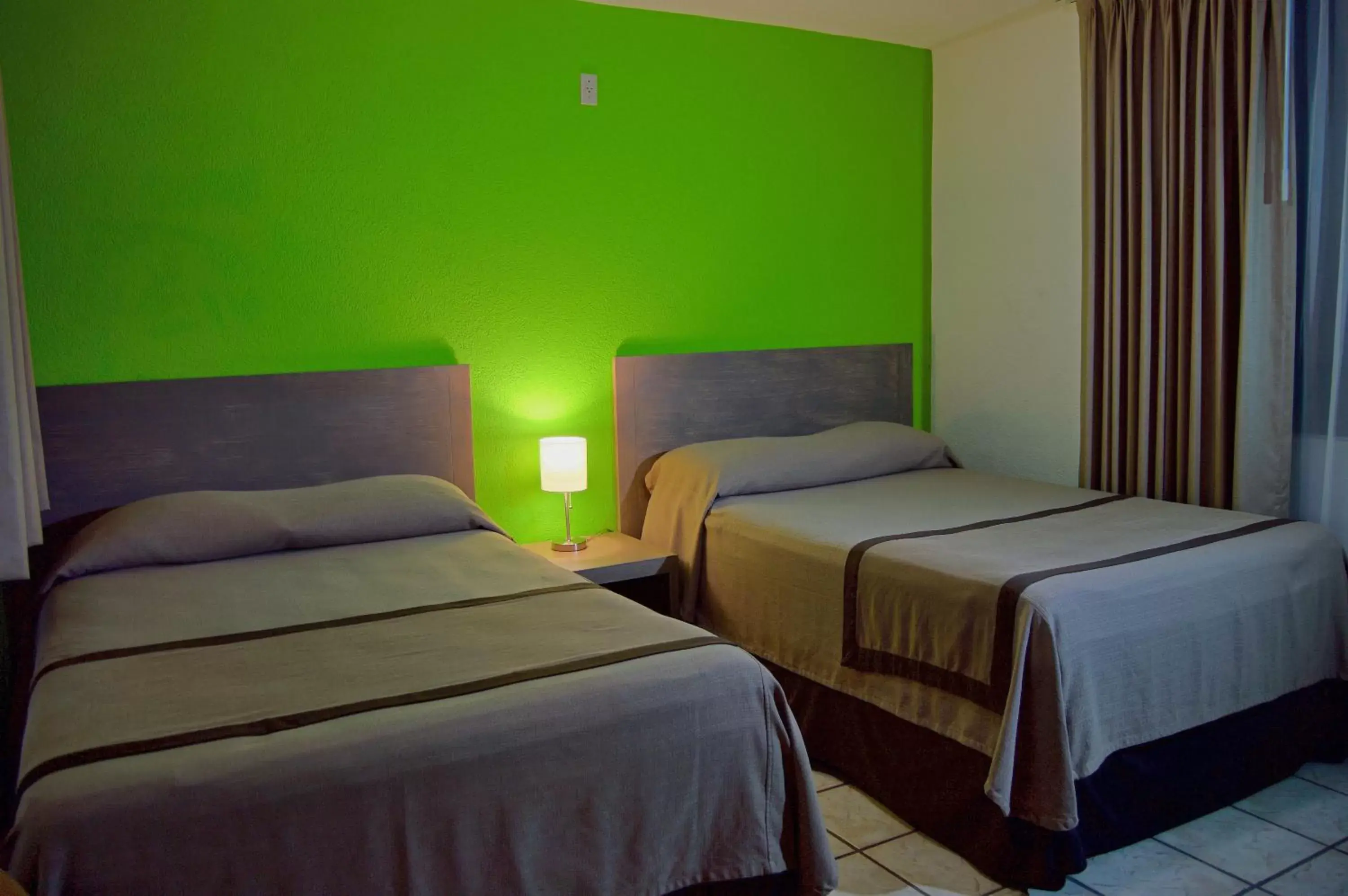 Bedroom, Bed in Sunrock Hotel & Suites